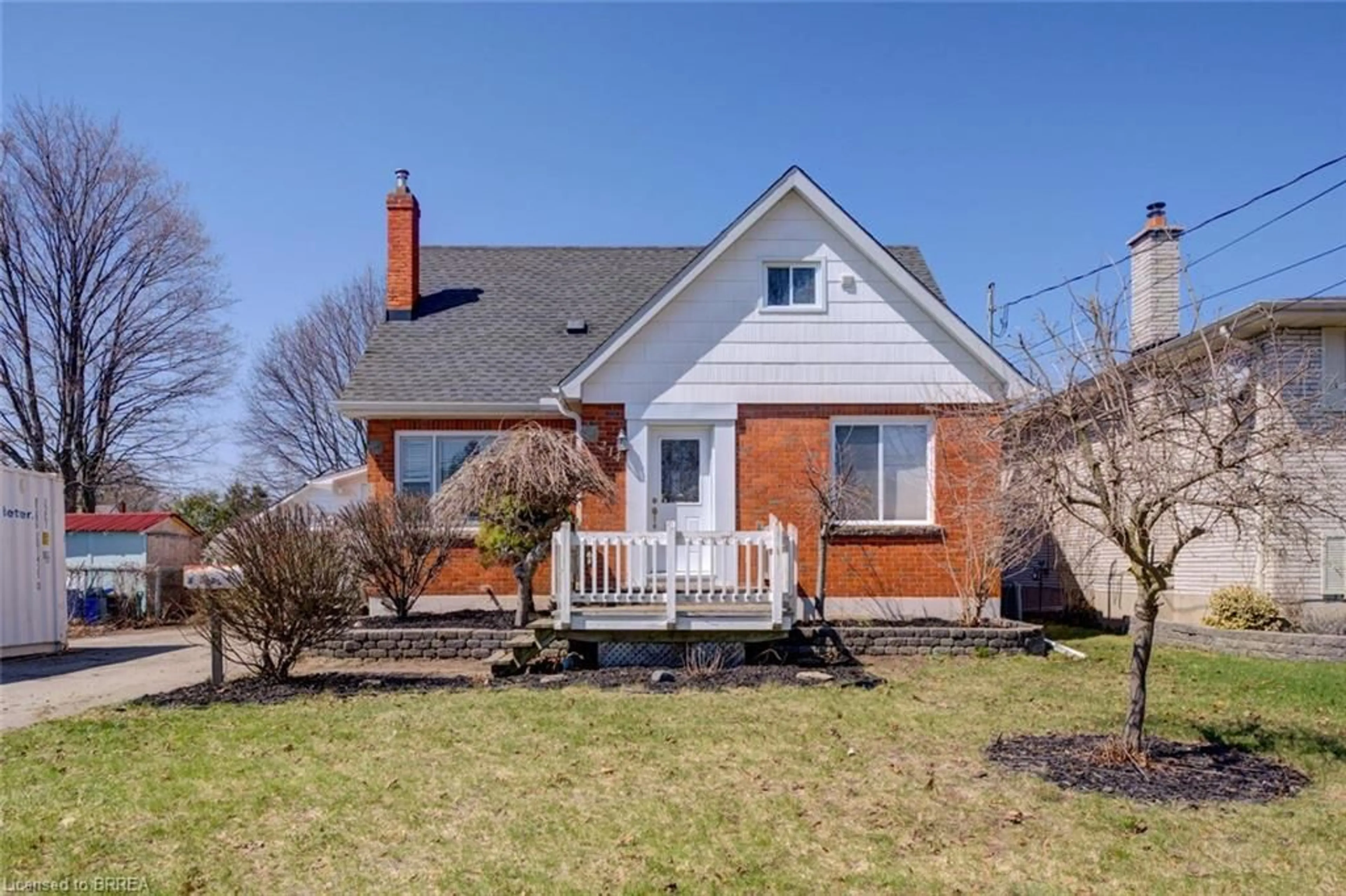 Home with brick exterior material, street for 214 Grand St, Brantford Ontario N3R 4C3