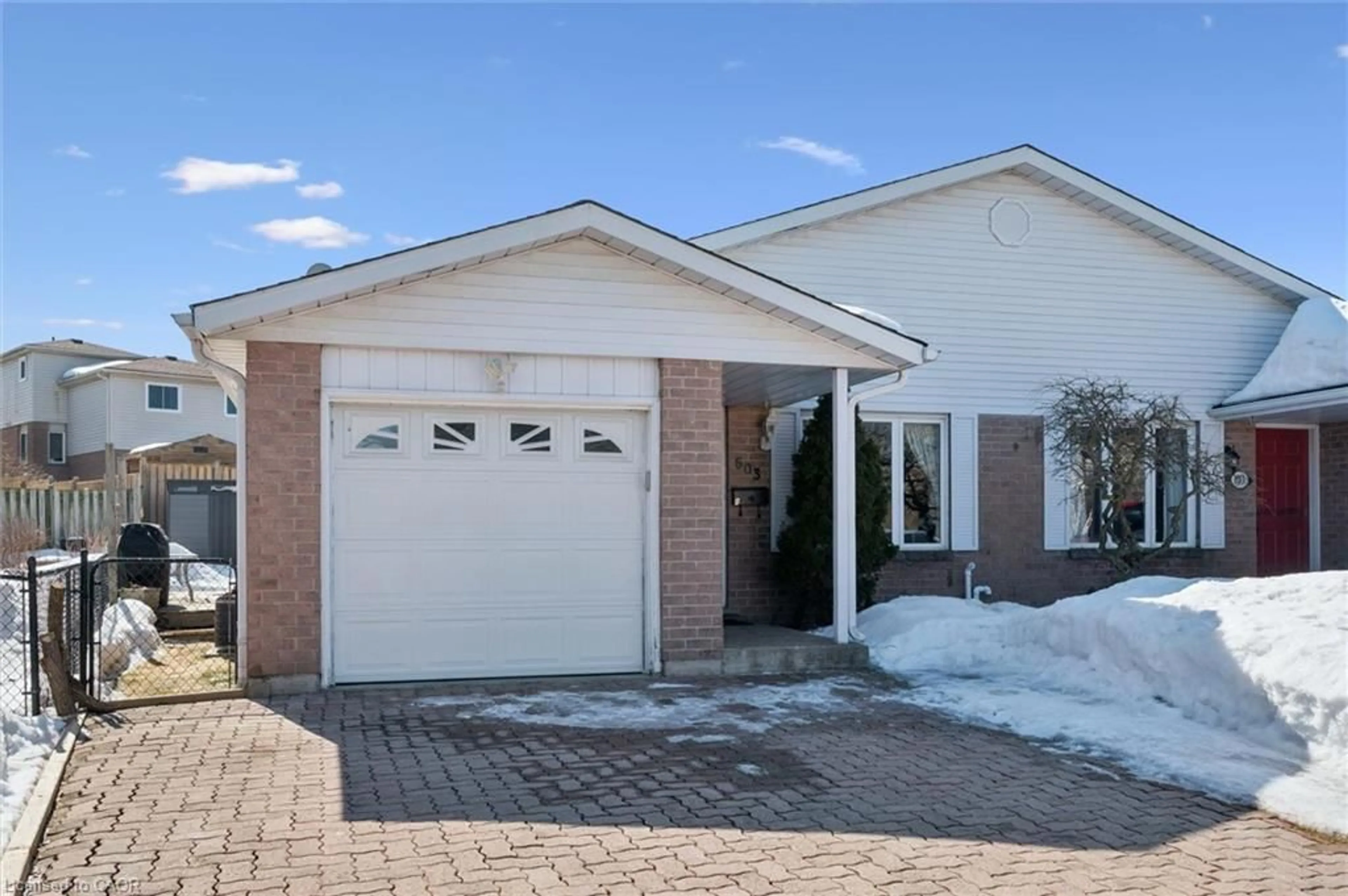 Home with brick exterior material, street for 603 Royal Beech Dr #A, Waterloo Ontario N2T 2K3