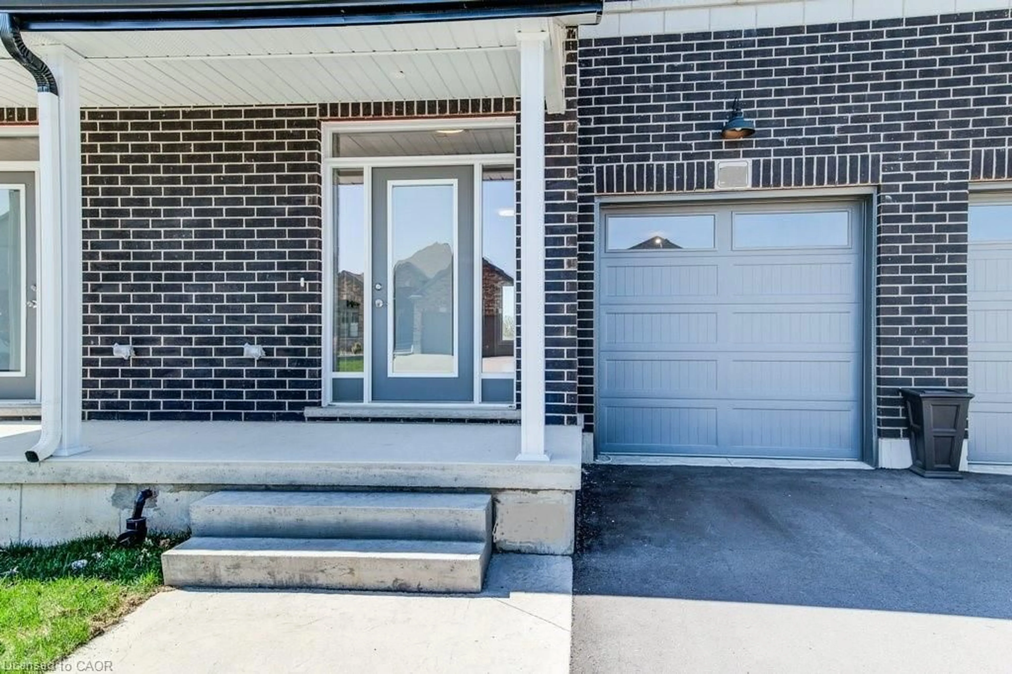 Home with brick exterior material, street for 224 Keeso Lane, Listowel Ontario N4W 0C3