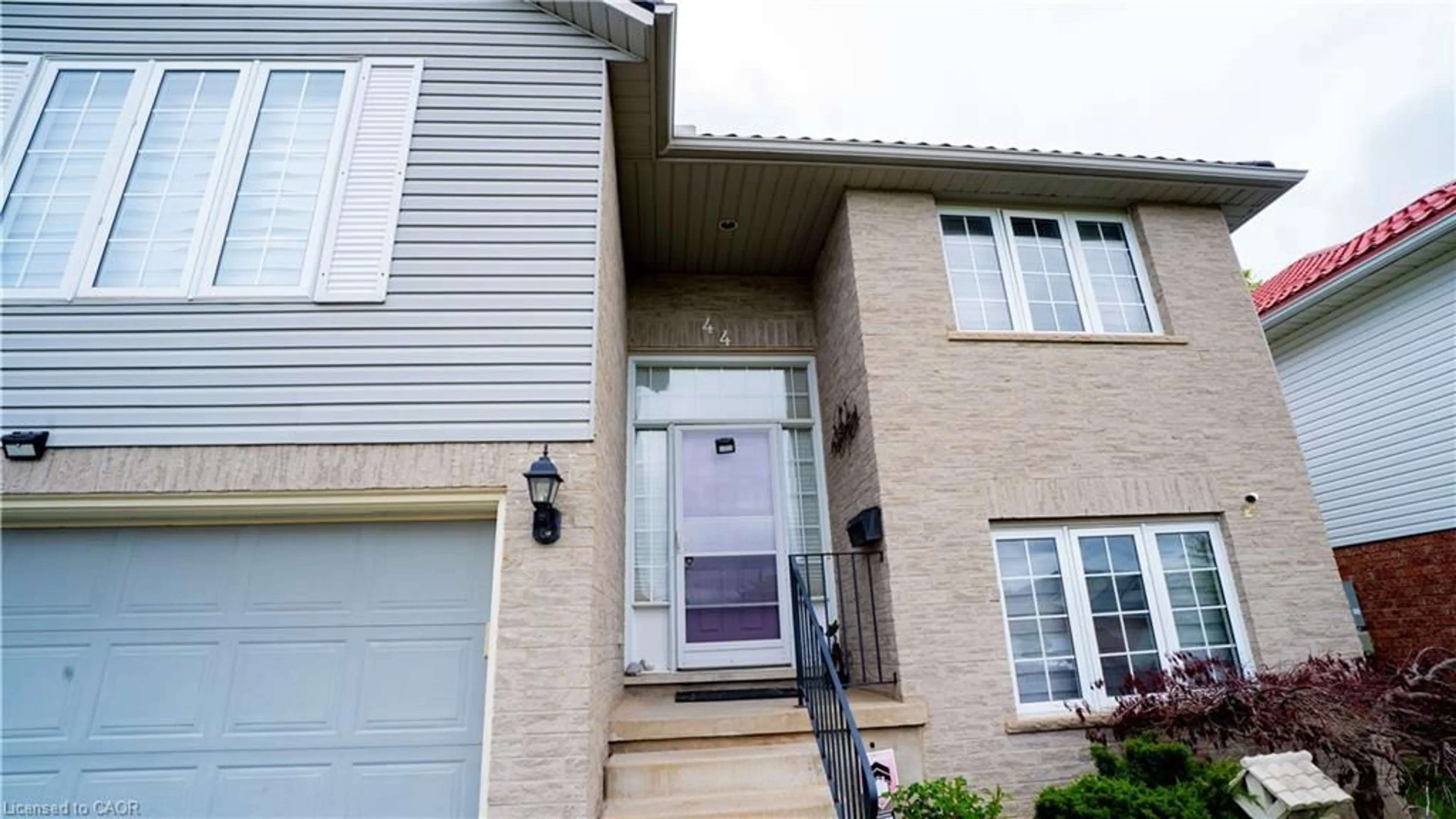 Home with vinyl exterior material, street for 44 Dunnigan Dr, Kitchener Ontario N2B 3W5