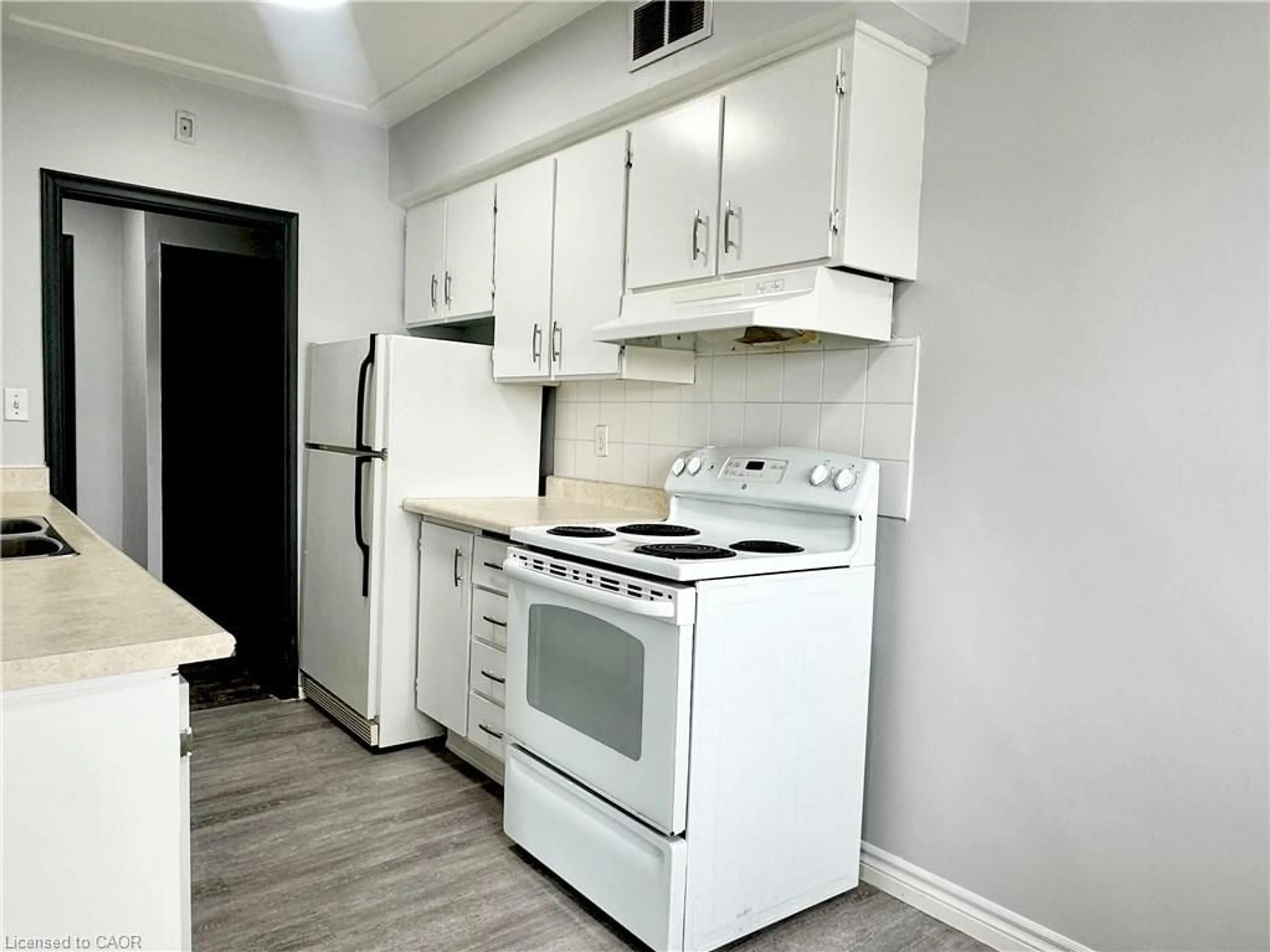 Standard kitchen, wood/laminate floor for 11 Woodman Dr, Hamilton Ontario L8K 4E3