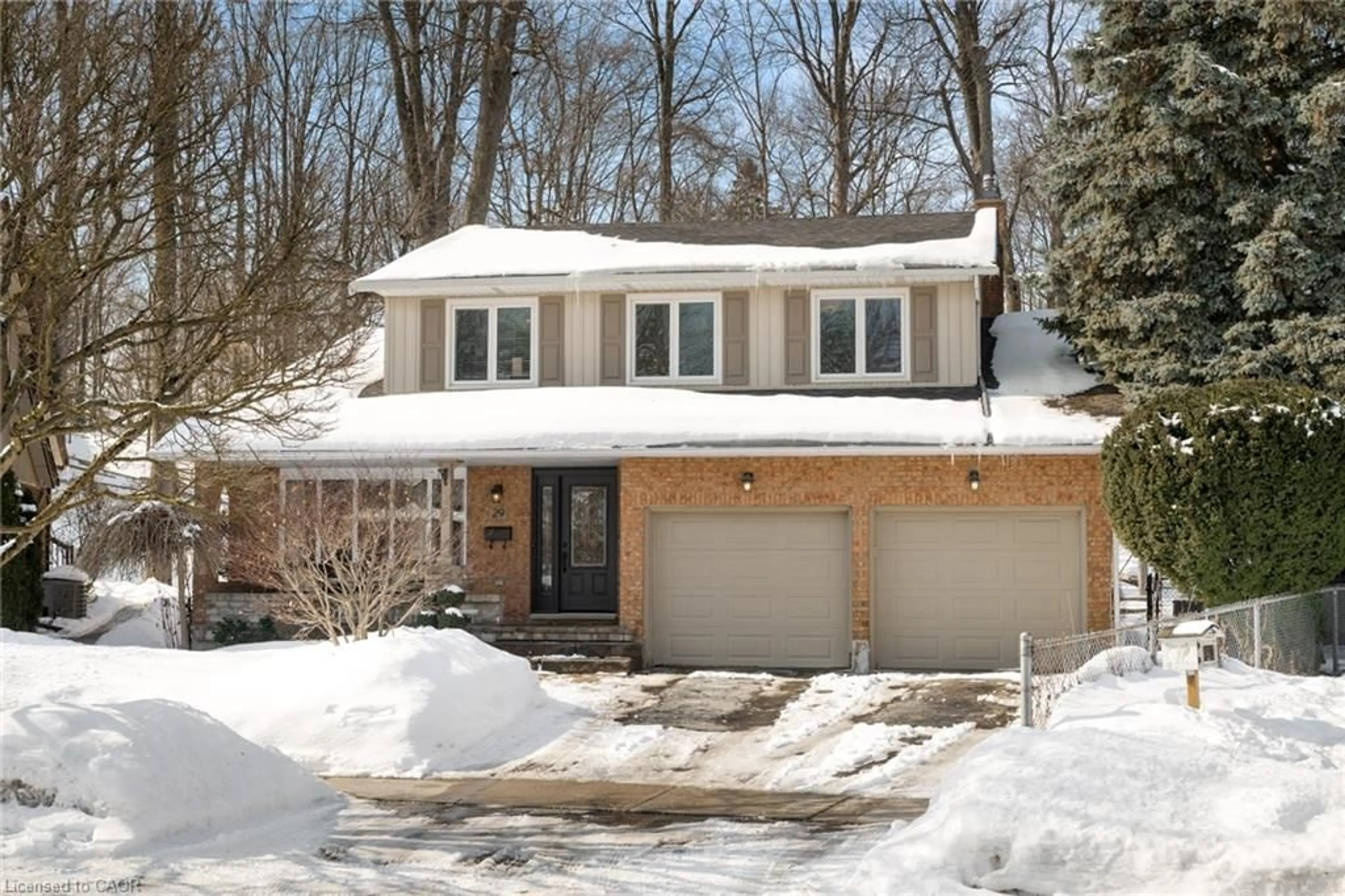 Home with brick exterior material, street for 29 Muskoka Crt, Kitchener Ontario N2B 3M2