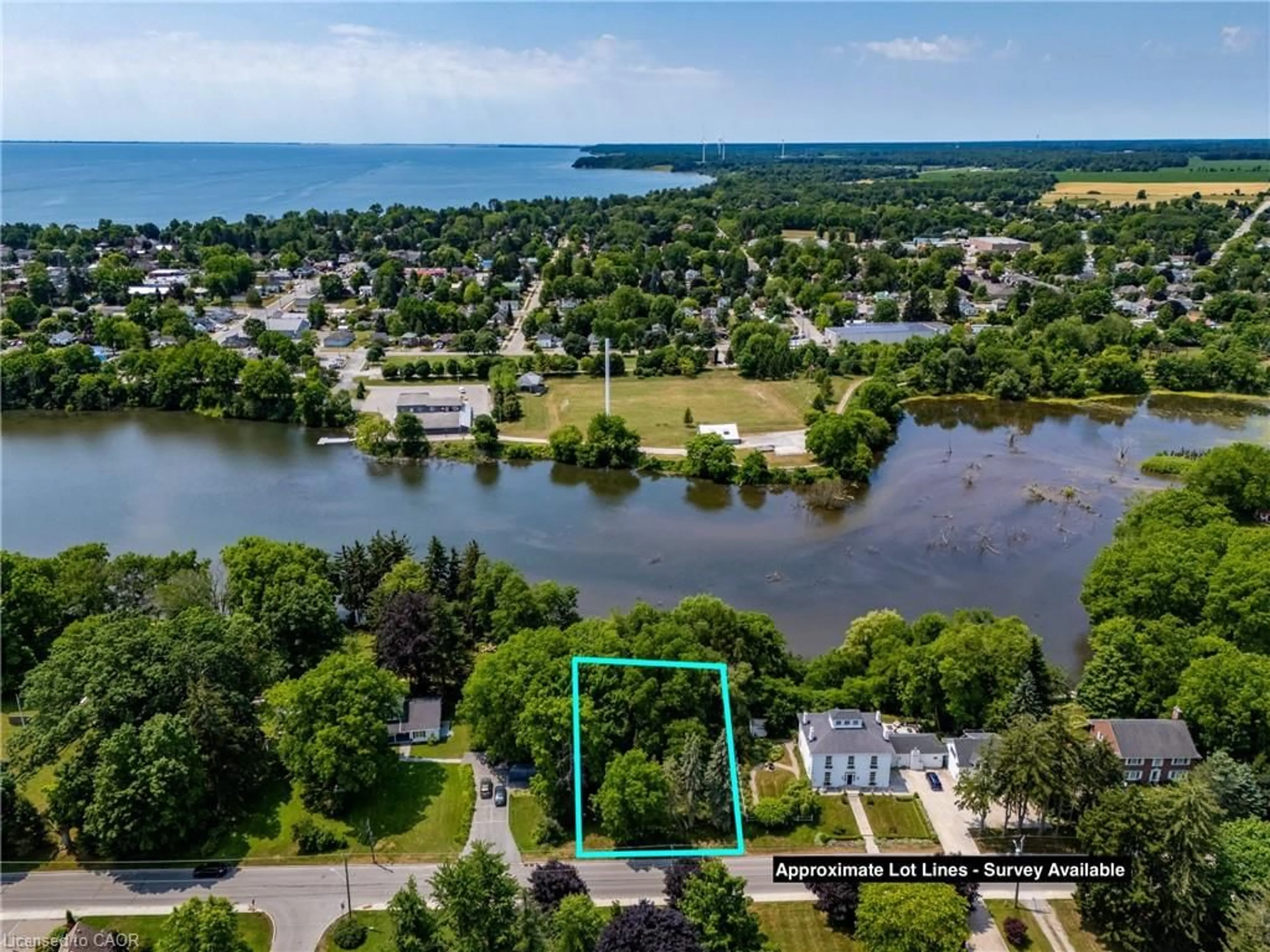 A pic from outside/outdoor area/front of a property/back of a property/a pic from drone, water/lake/river/ocean view for 41 Prospect St, Port Dover Ontario N0A 1N6