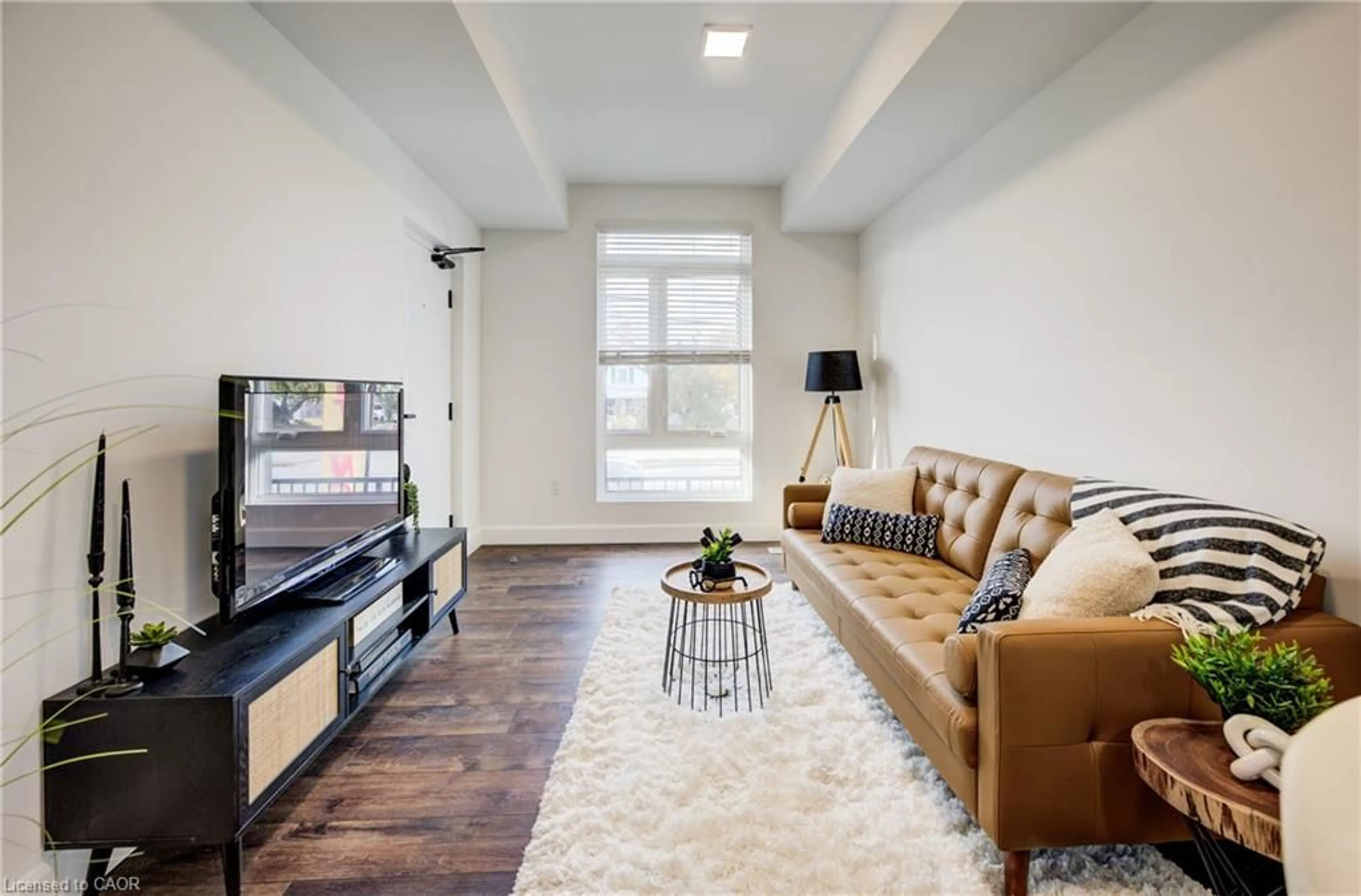 Living room with furniture, unknown for 132 Woolwich St #104, Kitchener Ontario N2K 0H9