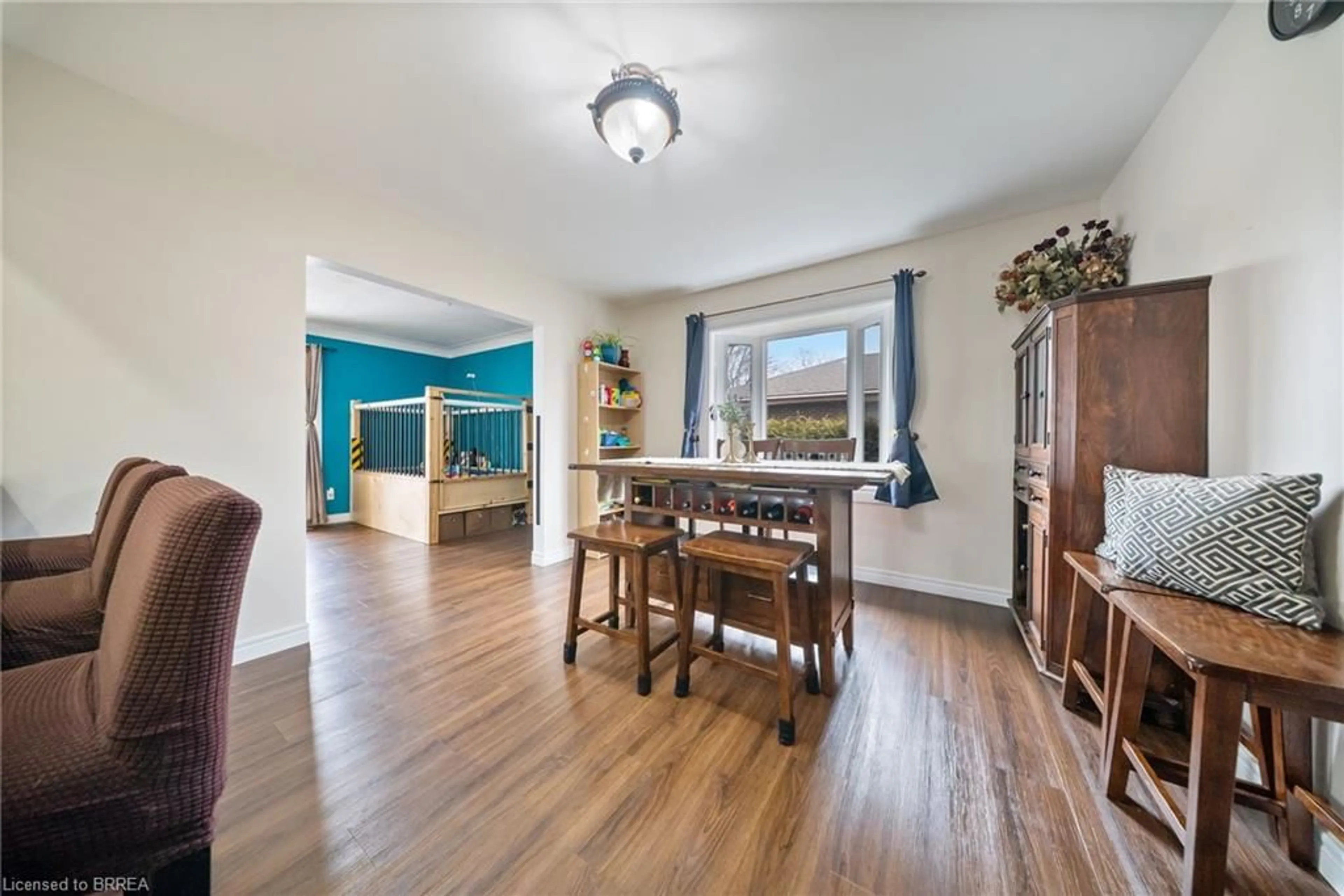 Dining room, wood/laminate floor for 12 Paris Rd, Brantford Ontario N3R 1H7