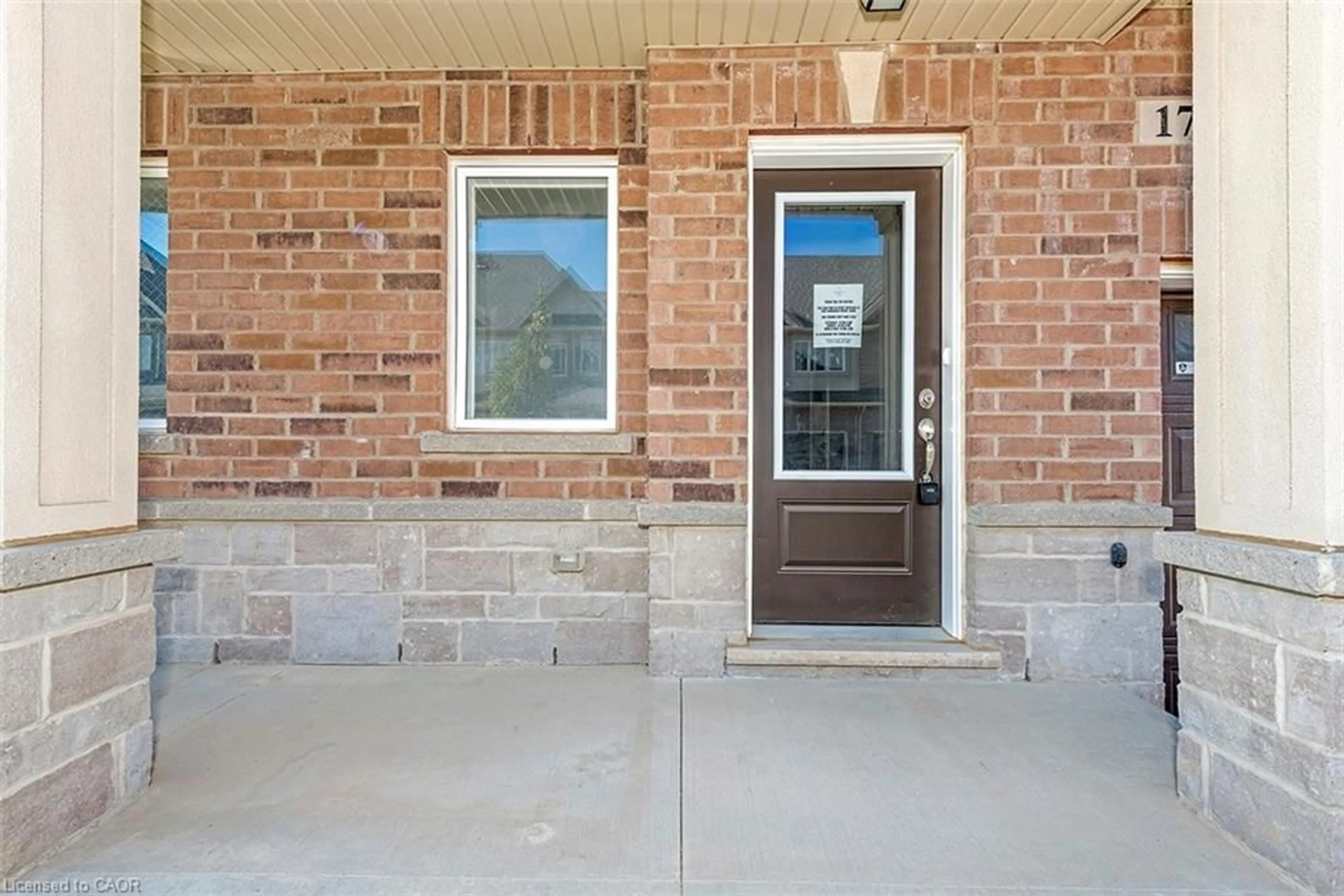 Home with brick exterior material, street for 205 Thames Way #17, Hamilton Ontario L0R 1W2