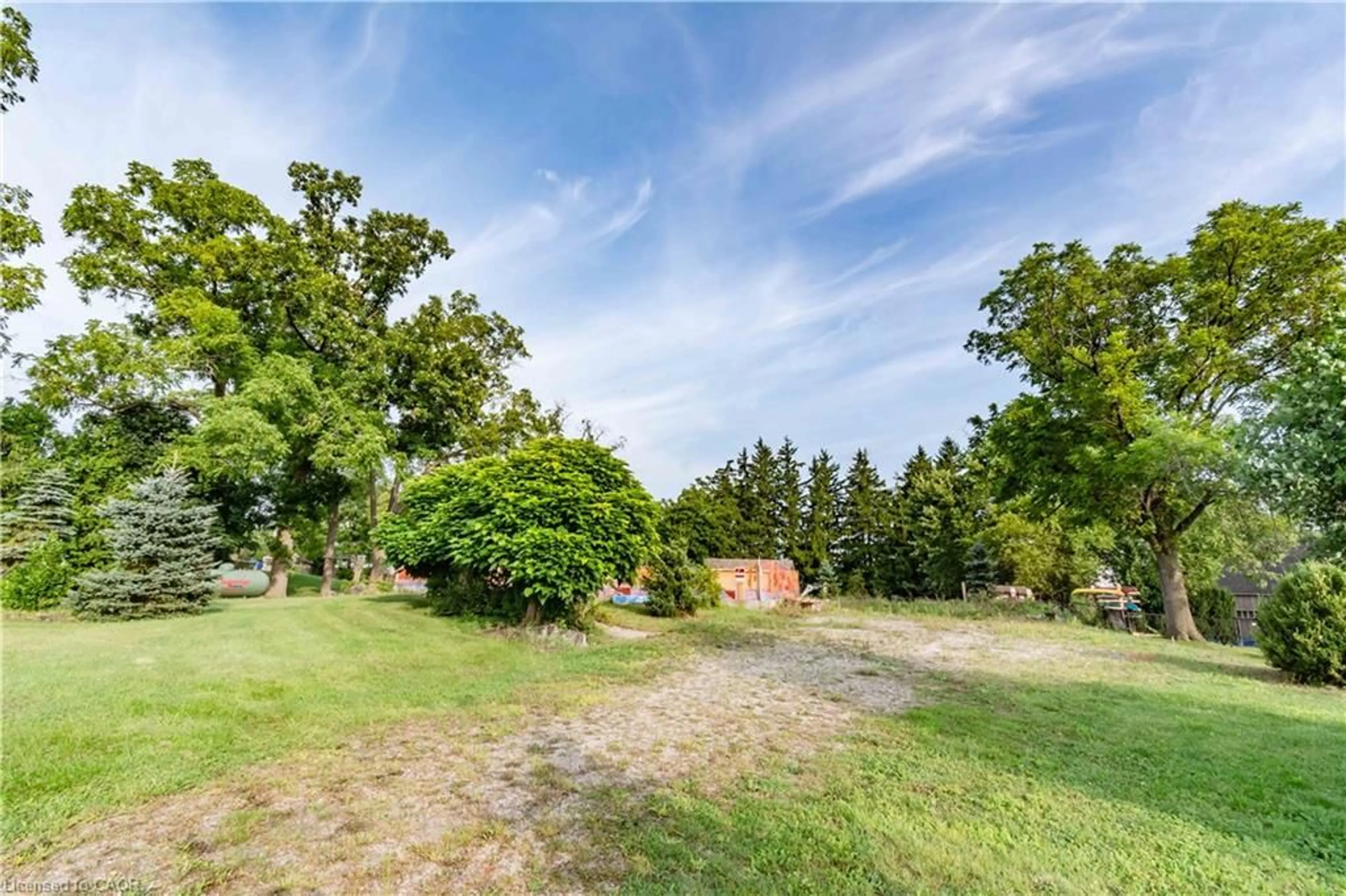 A pic from outside/outdoor area/front of a property/back of a property/a pic from drone, forest/trees view for 721 Hwy 54, Brantford Ontario N3S 0G2