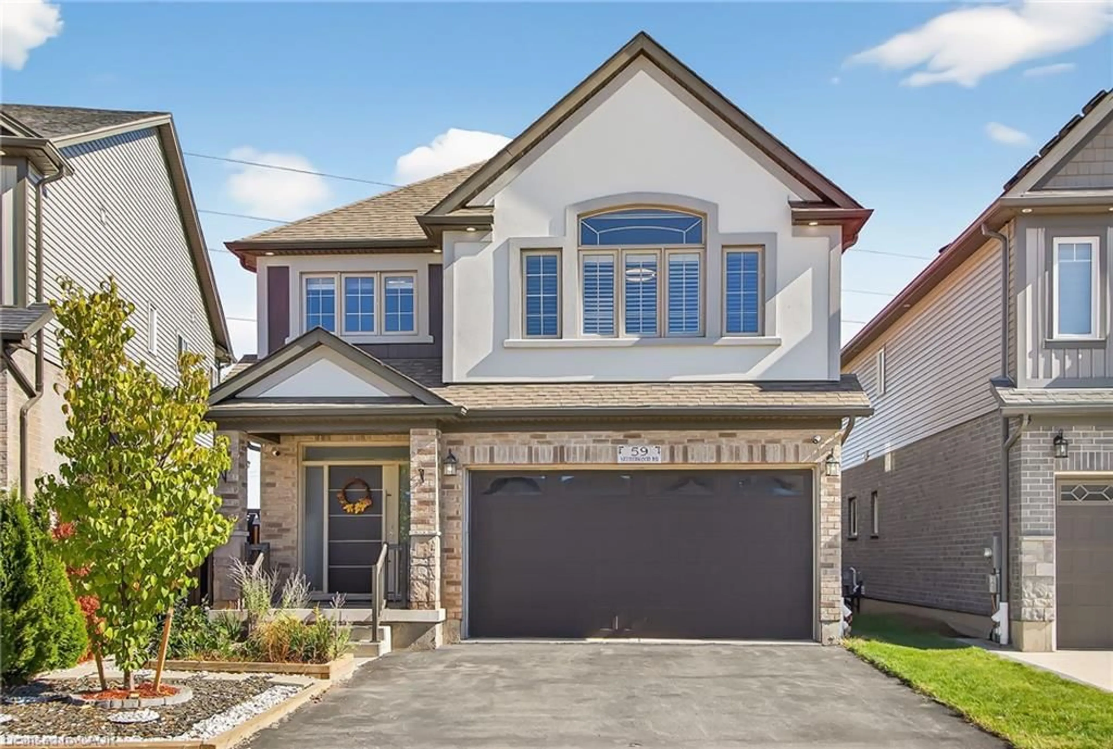 Home with brick exterior material, street for 59 Netherwood Rd, Kitchener Ontario N2P 0E4