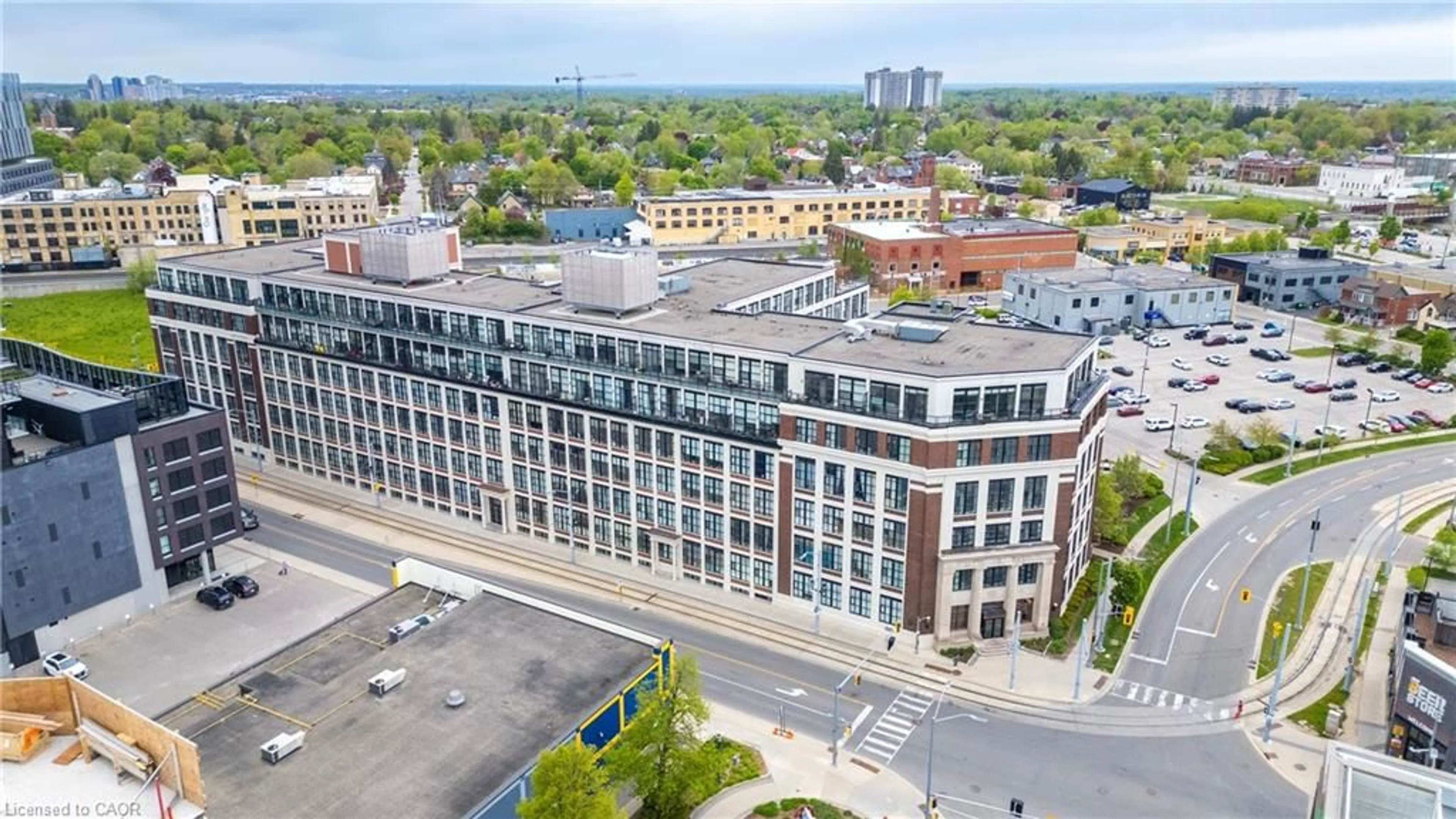 A pic from outside/outdoor area/front of a property/back of a property/a pic from drone, city buildings view from balcony for 410 King St #126, Kitchener Ontario N2G 1C3