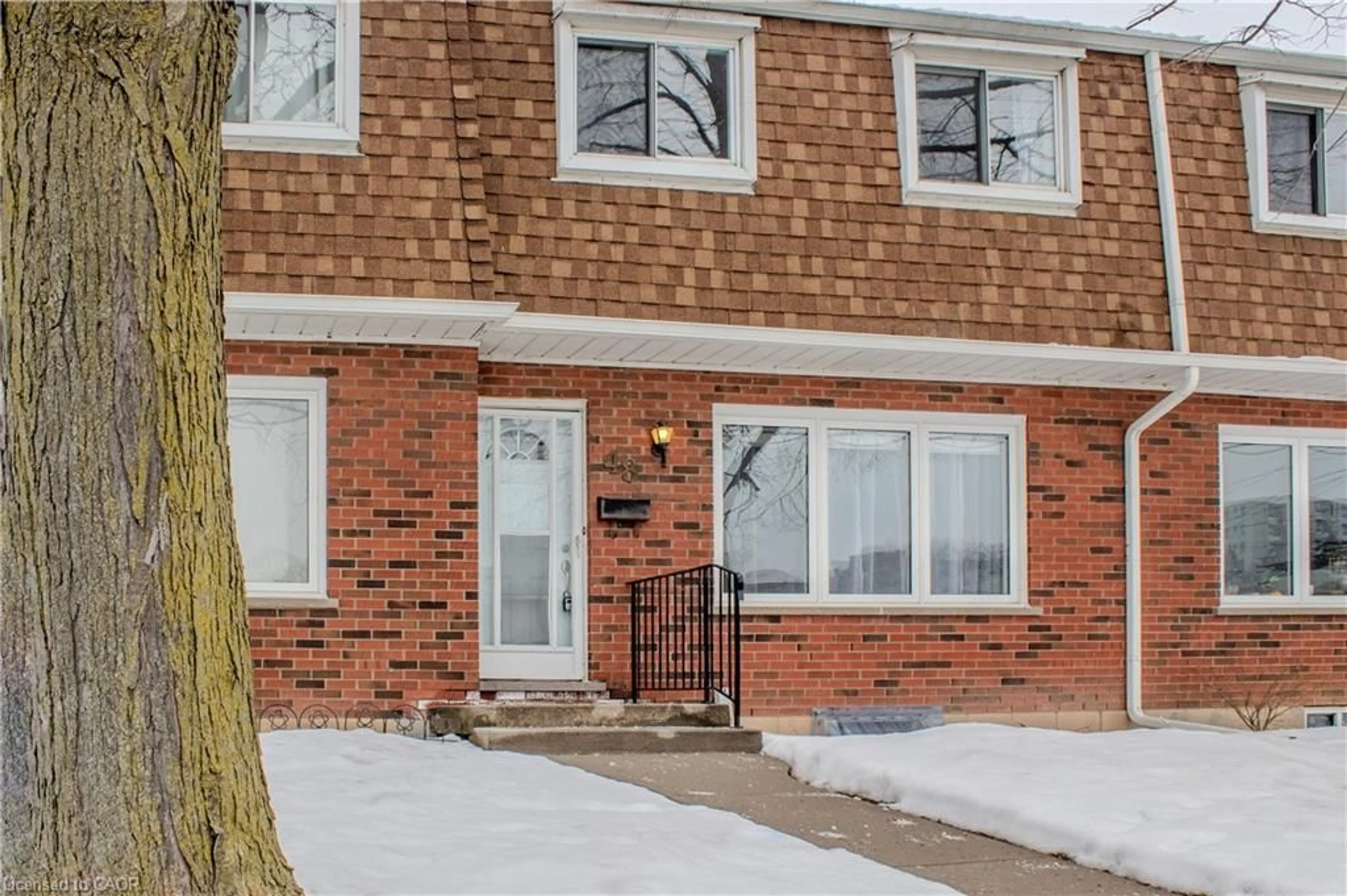 Home with brick exterior material, street for 48 Riverdale Dr #2, Hamilton Ontario L8E 1K3