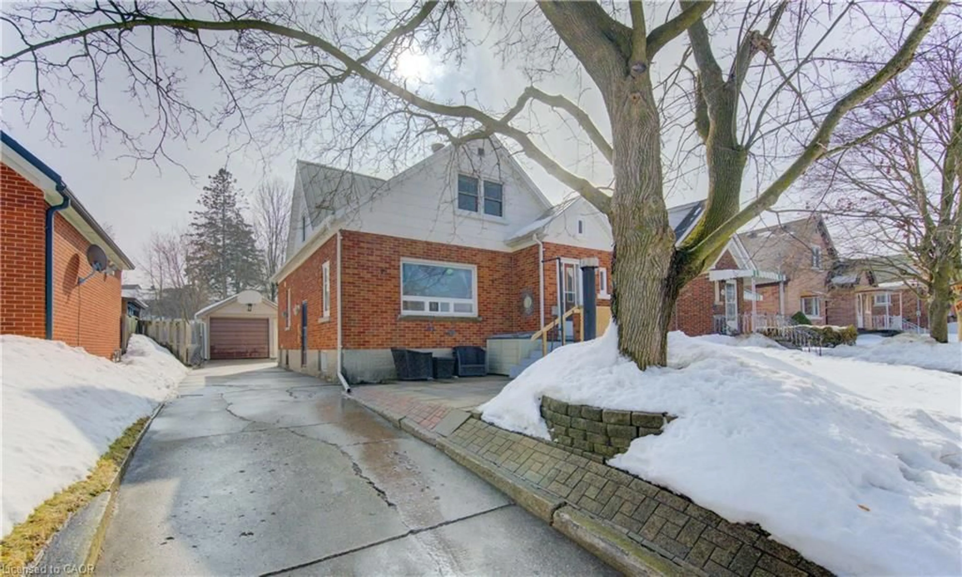 Home with brick exterior material, street for 83 Arnold St, Kitchener Ontario N2H 6C9