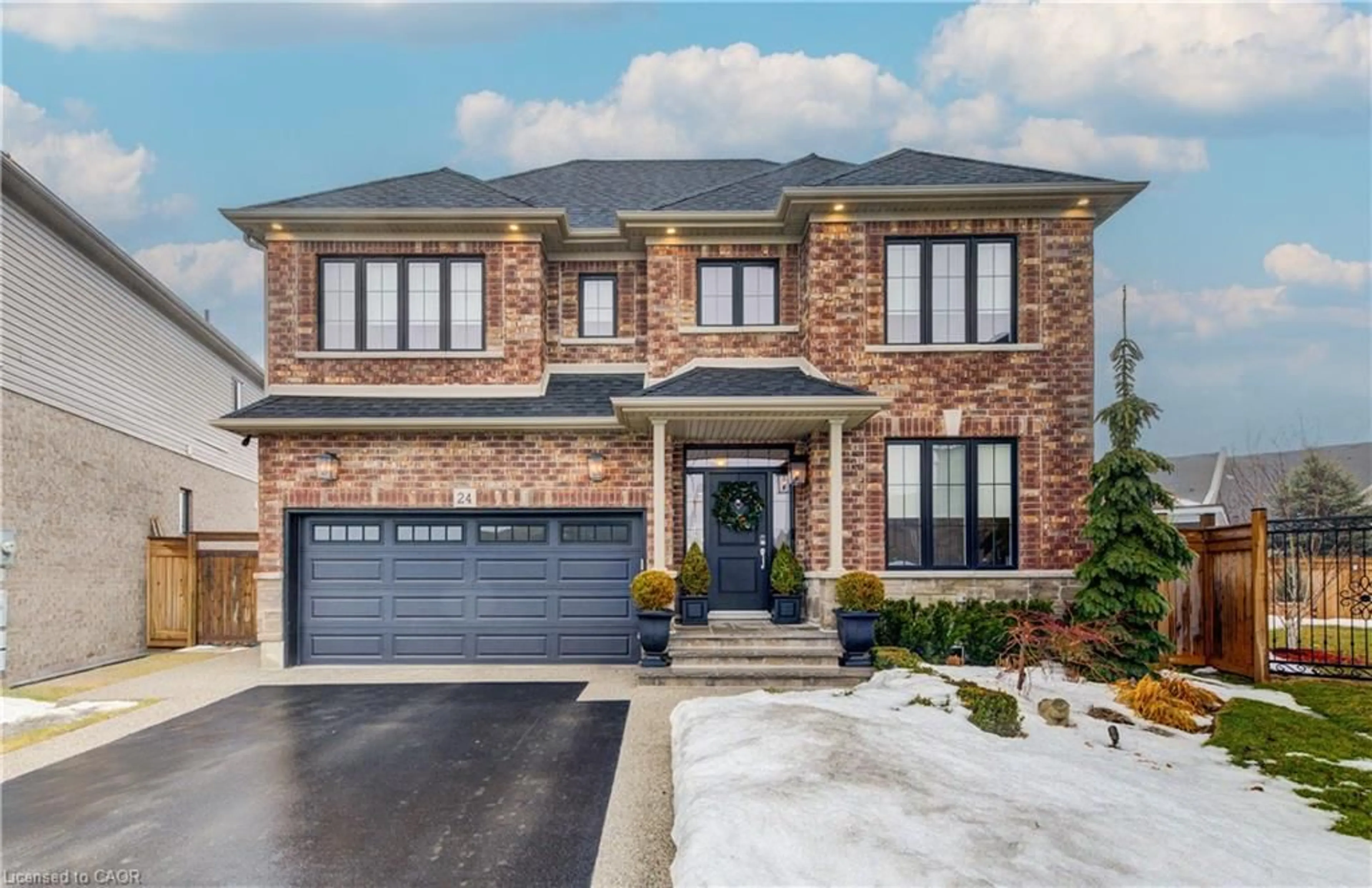 Home with brick exterior material, street for 24 Festival Way, Binbrook Ontario L0R 1C0