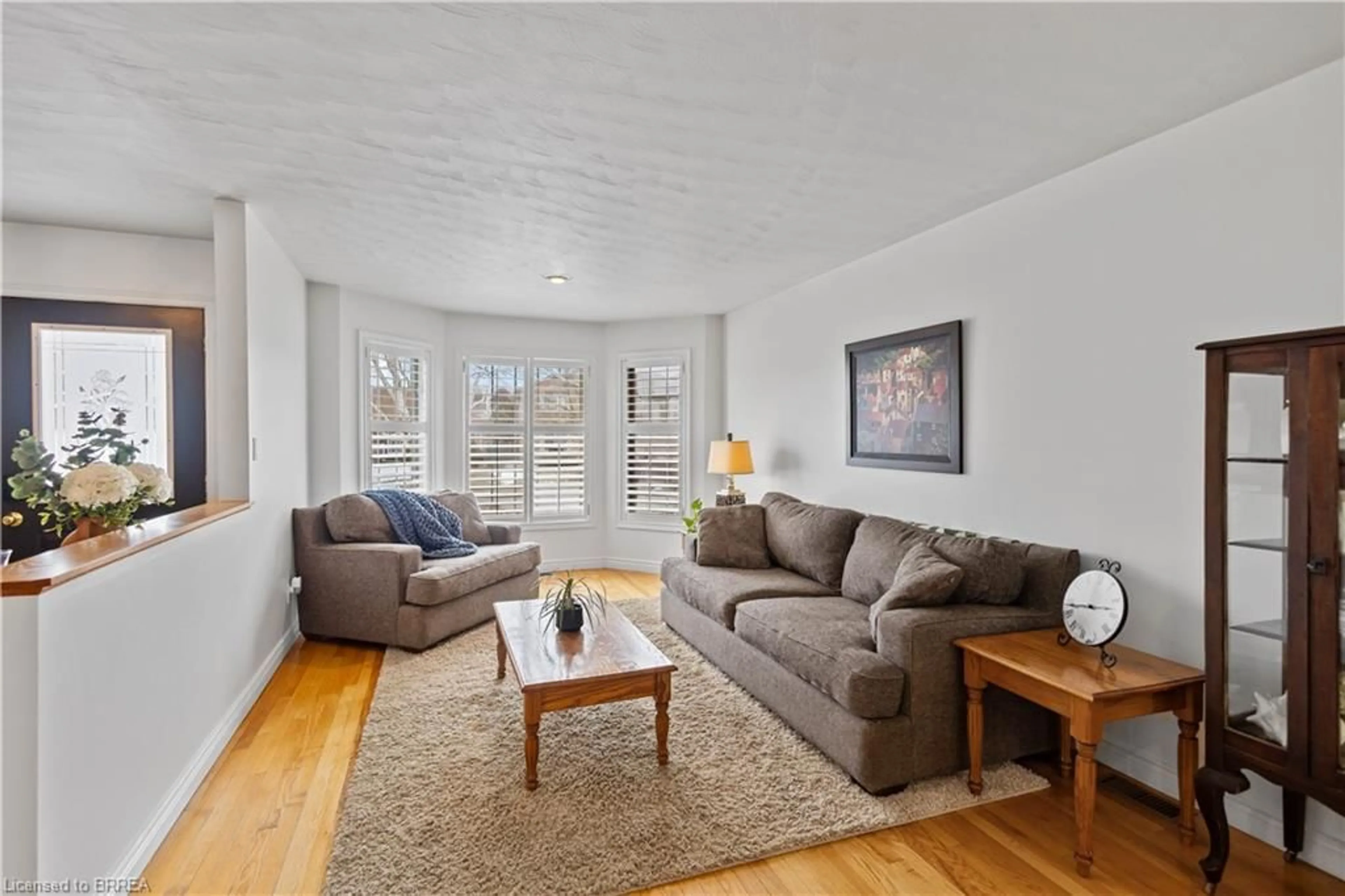 Living room with furniture, unknown for 12 Falls Cres, Simcoe Ontario N3Y 5K5