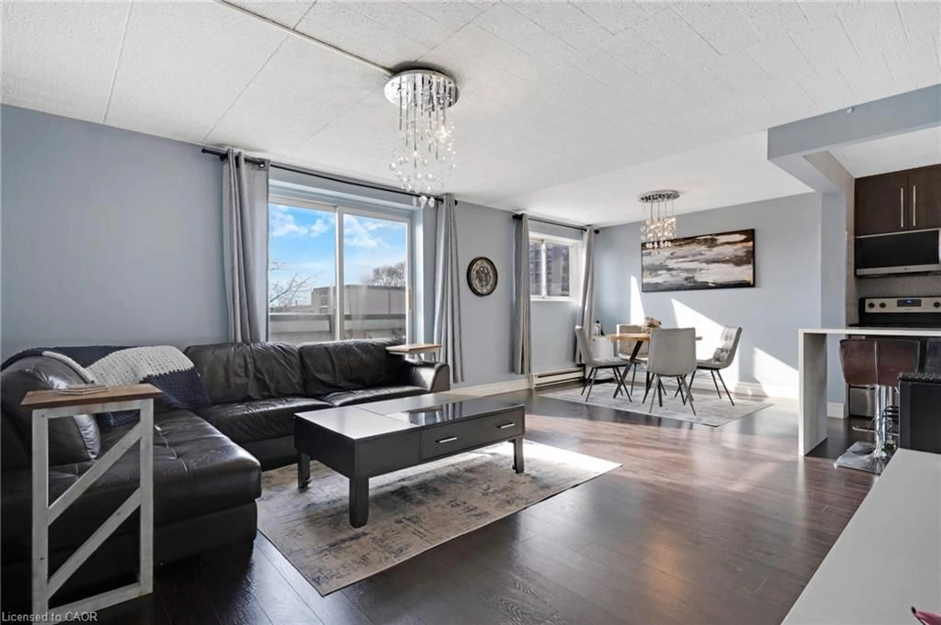 Living room with furniture, unknown for 6 Walton Ave #310, Kitchener Ontario N2C 2B5