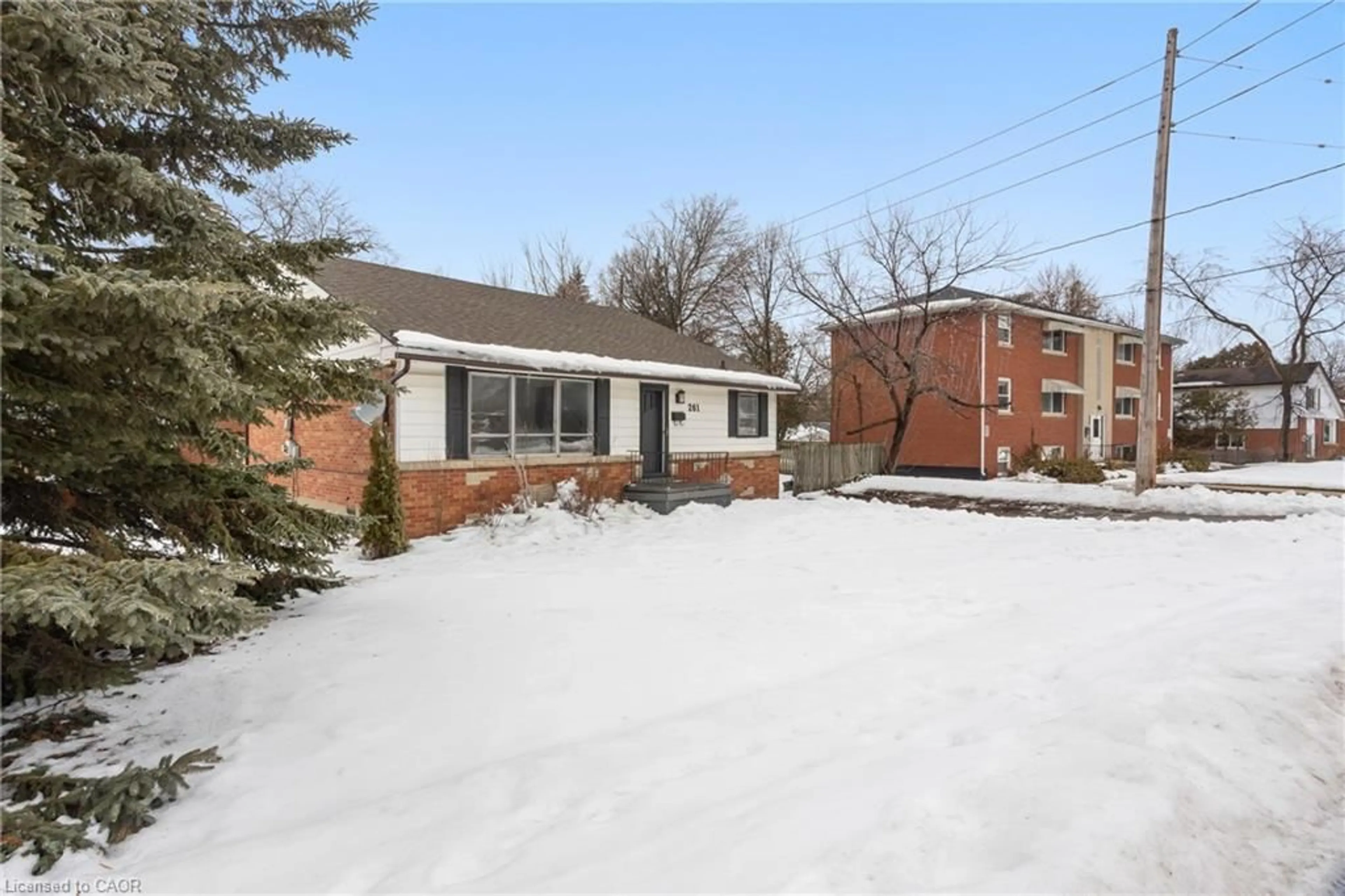 Home with brick exterior material, street for 261 Water St, Guelph Ontario N1G 1B6
