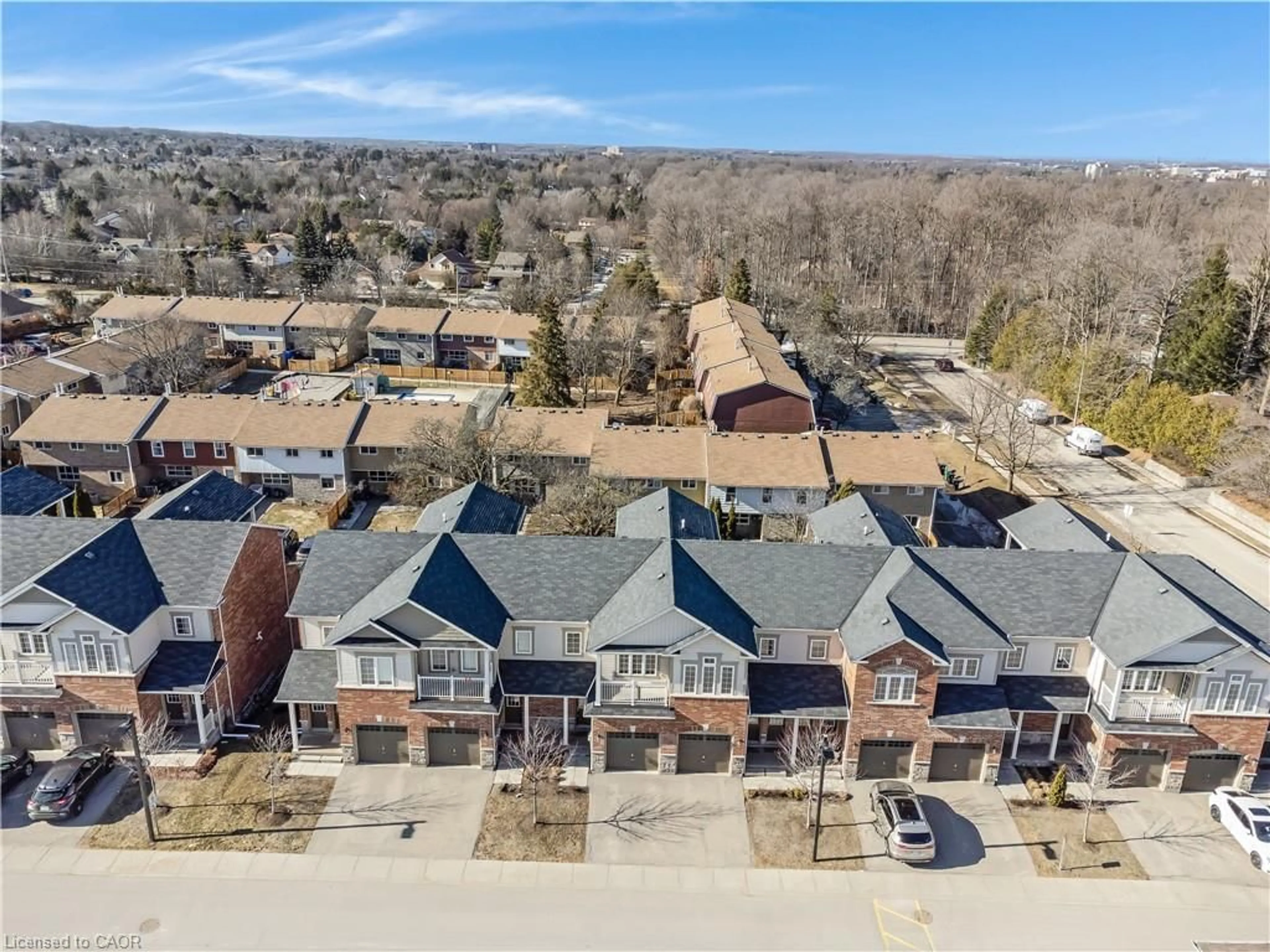 A pic from outside/outdoor area/front of a property/back of a property/a pic from drone, street for 403 Westwood Dr #9, Kitchener Ontario N2M 0B5