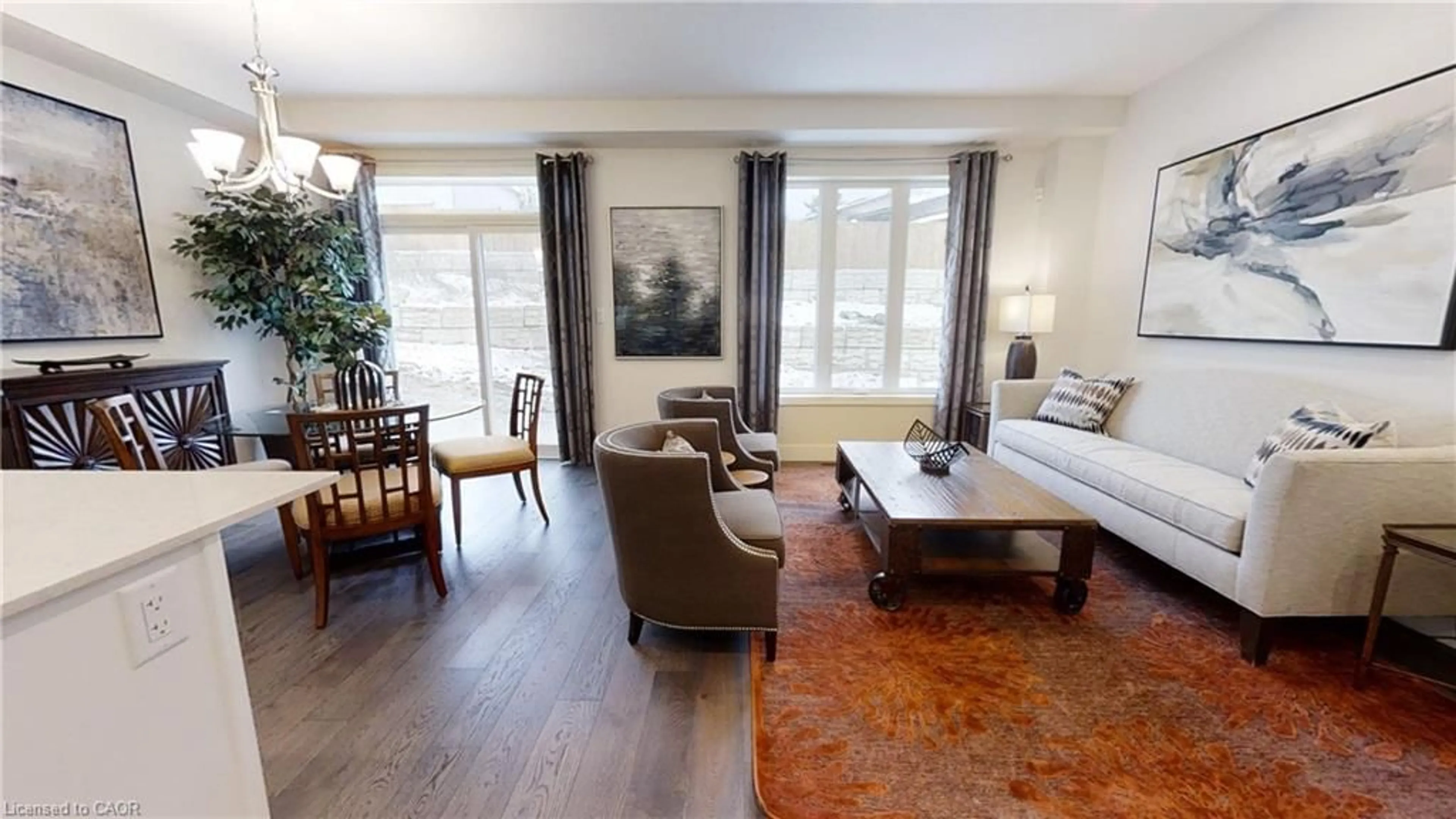 Living room with furniture, wood/laminate floor for 73 Julie Cres, London Ontario N5X 3X4