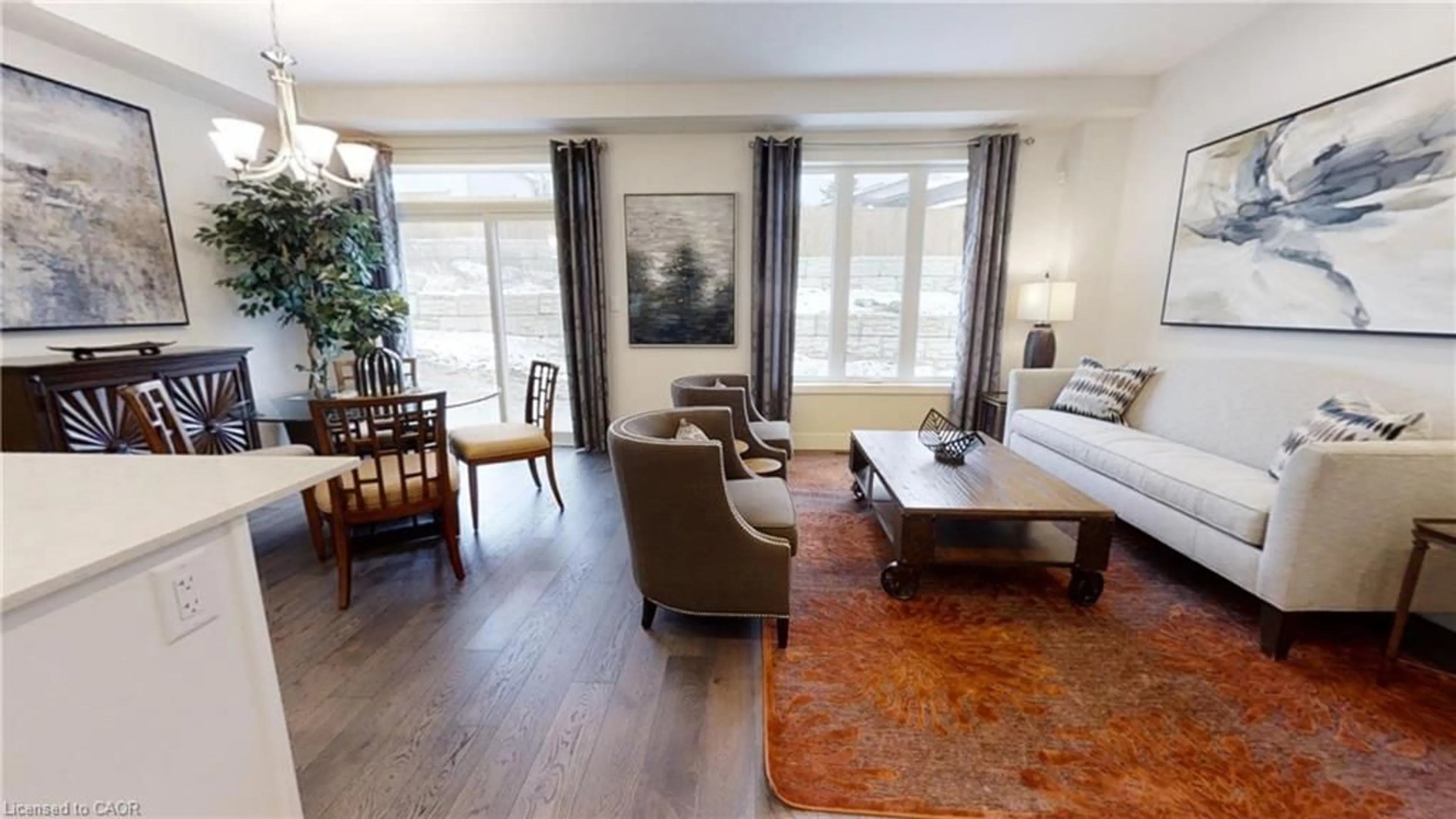 Living room with furniture, wood/laminate floor for 73 Julie Cres, London Ontario N5X 3X4