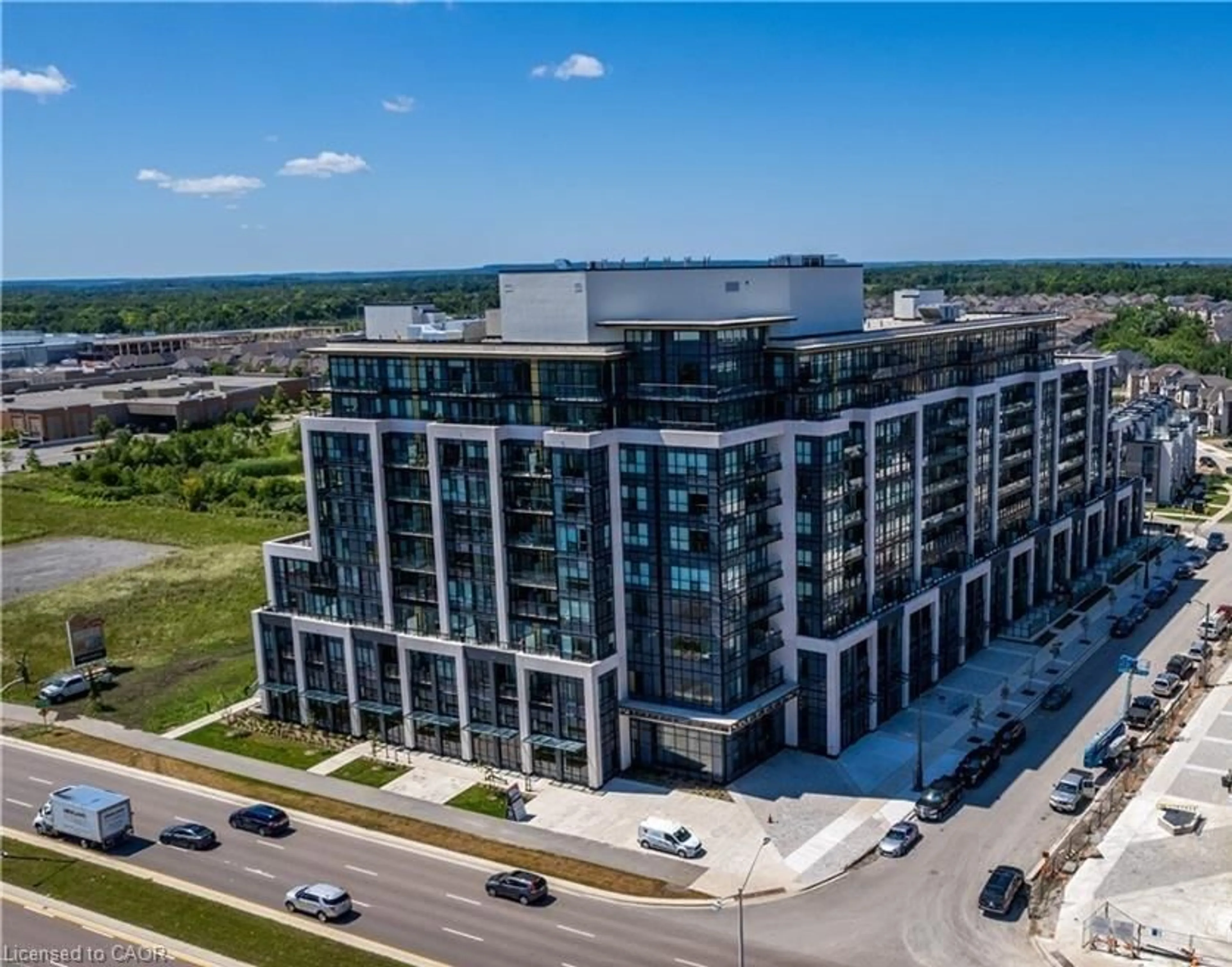 A pic from outside/outdoor area/front of a property/back of a property/a pic from drone, building for 405 Dundas St #425, Oakville Ontario L6M 5P9