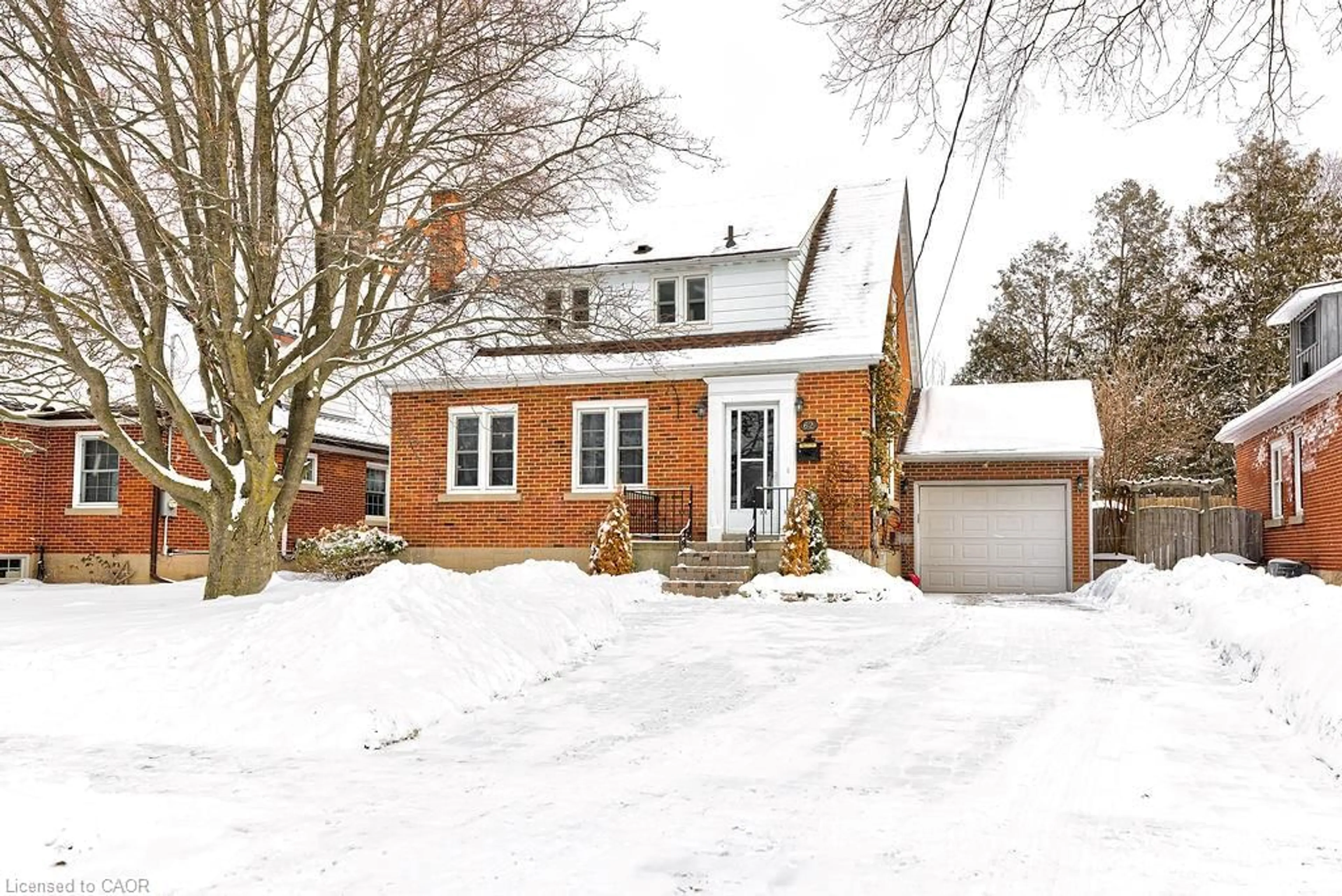 Home with brick exterior material, street for 62 Brentwood Ave, Kitchener Ontario N2H 2C8