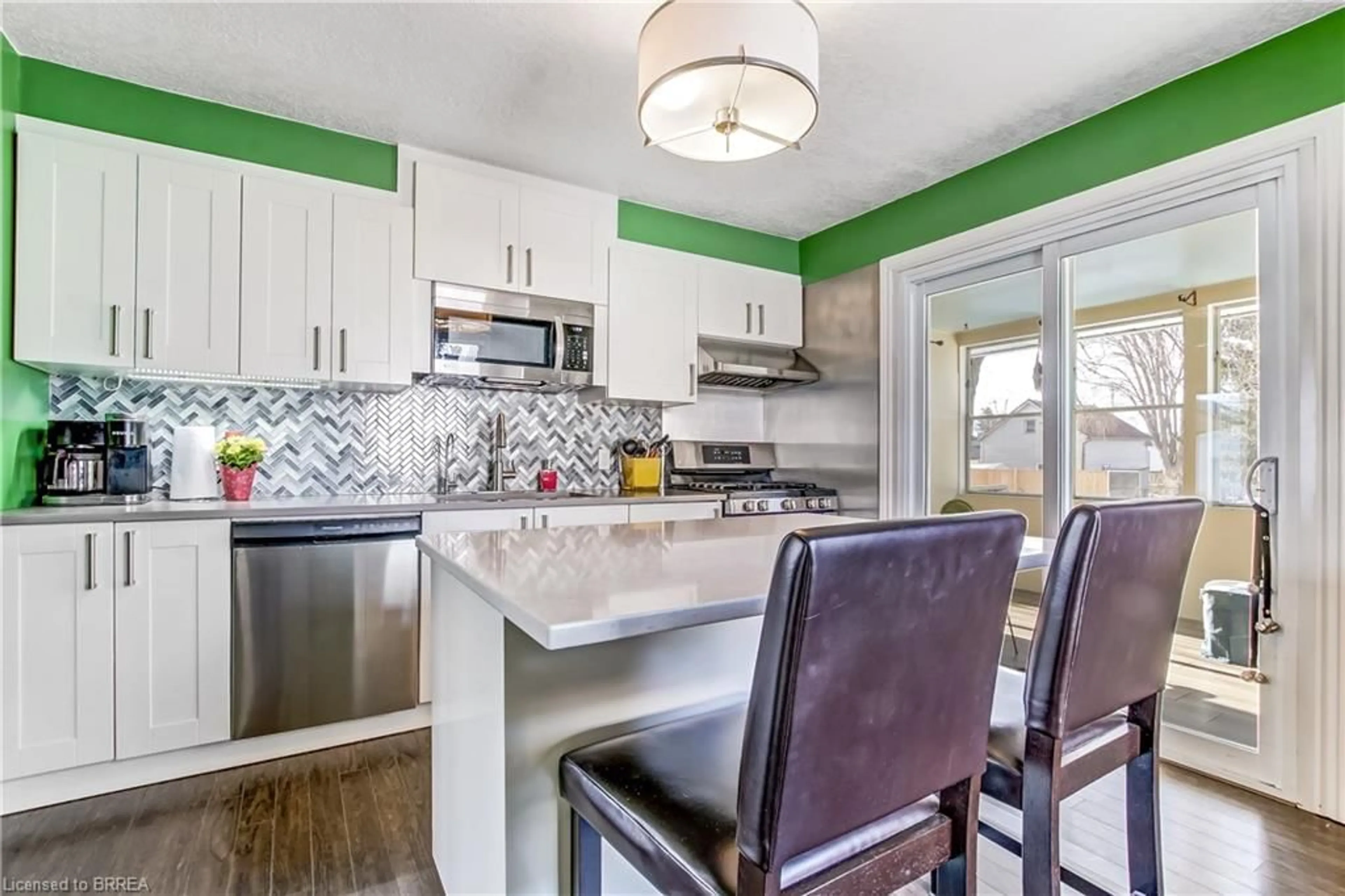 Open concept kitchen, ceramic/tile floor for 77 Doune St, Strathroy Ontario N7G 1M1