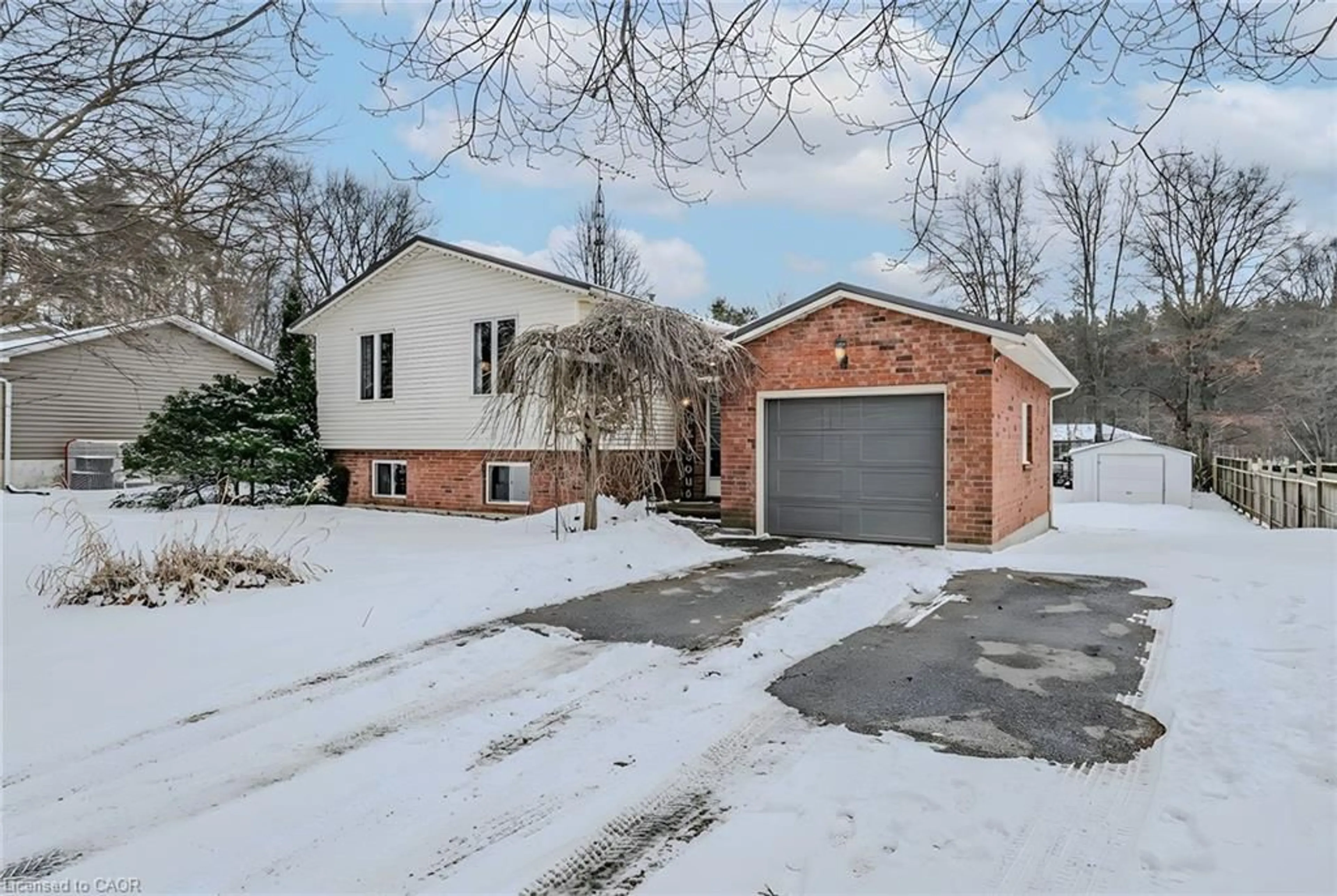 Home with brick exterior material, street for 13 Ridgeway Ave, Simcoe Ontario N3Y 4J9