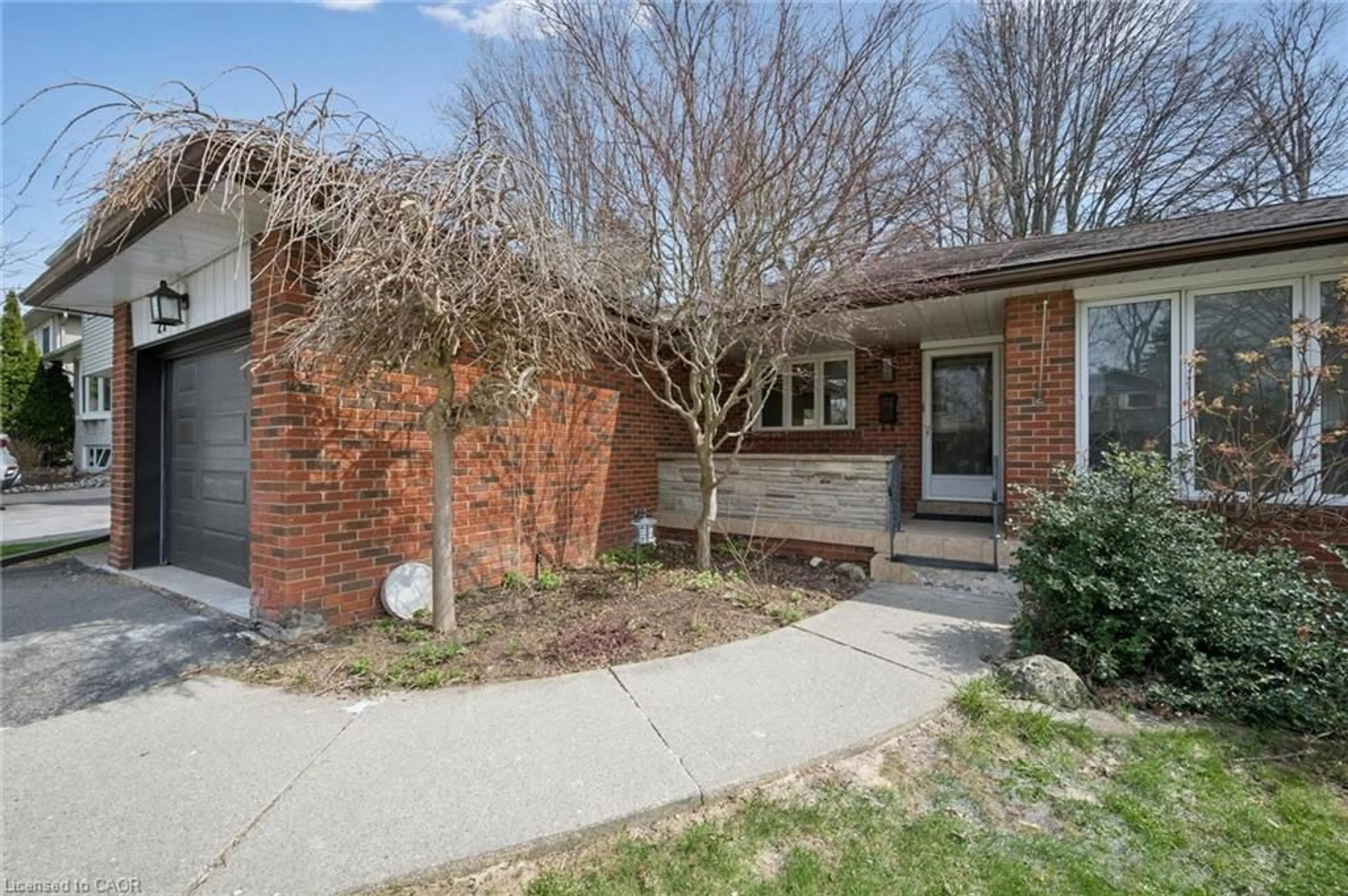 Home with brick exterior material, street for 27 Silverspring Cres, Kitchener Ontario N2M 4P1