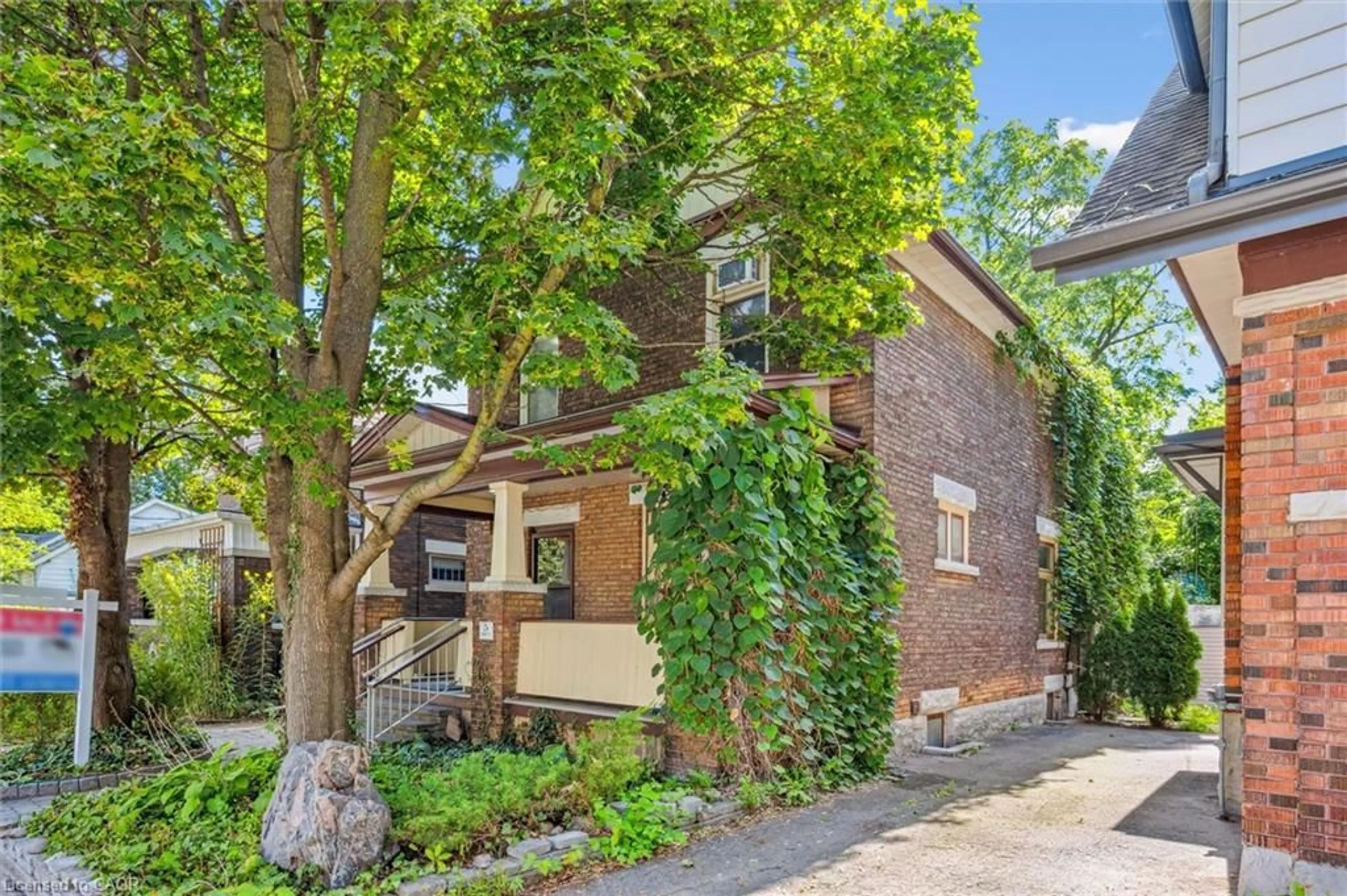 Home with brick exterior material, street for 5 Dekay St, Kitchener Ontario N2H 3T1