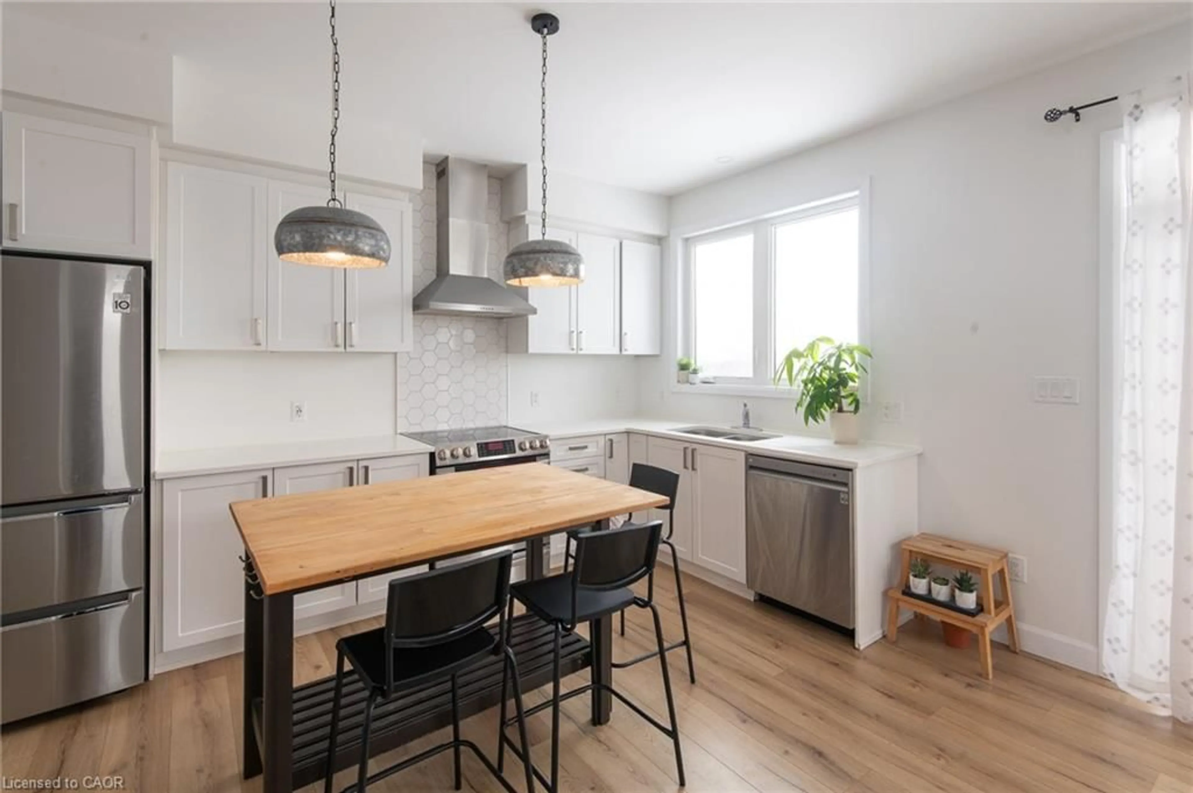 Open concept kitchen, wood/laminate floor for 143 Superior Dr, Amherstview Ontario K7N 1E5