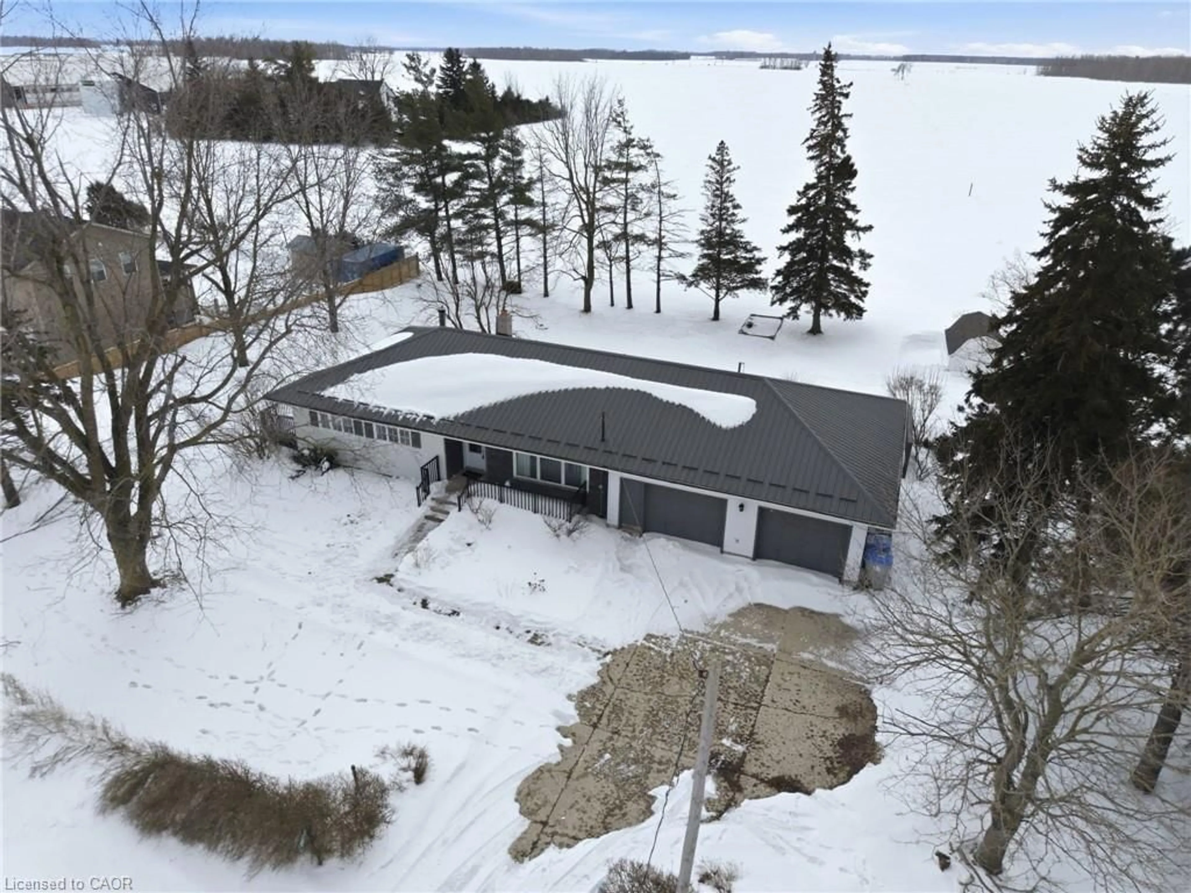 A pic from outside/outdoor area/front of a property/back of a property/a pic from drone, water/lake/river/ocean view for 8678 Perth Line 86 Line, Listowel Ontario N4W 3G8