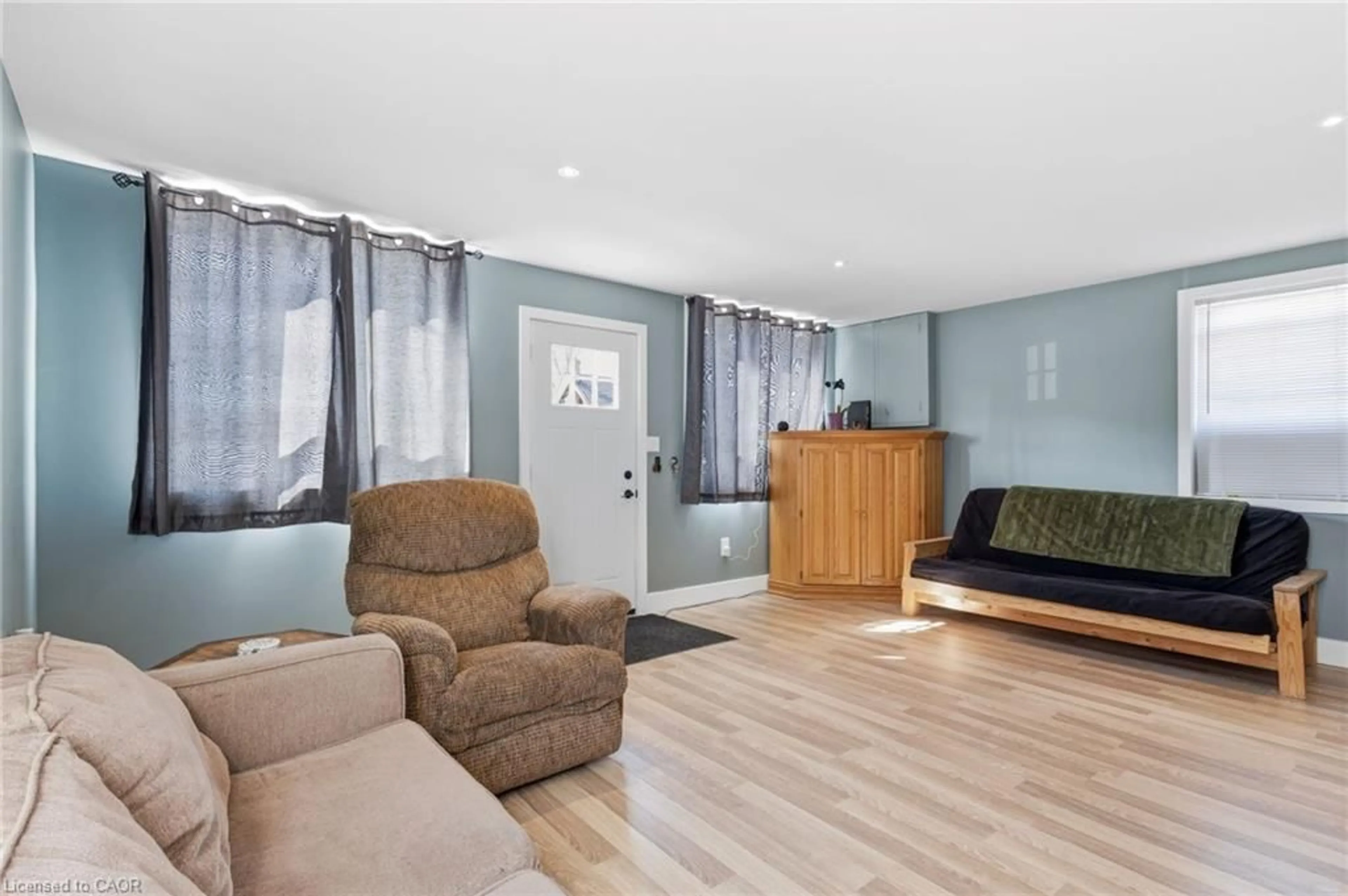 Living room with furniture, wood/laminate floor for 194 Townline St, St. Williams Ontario N0E 1P0