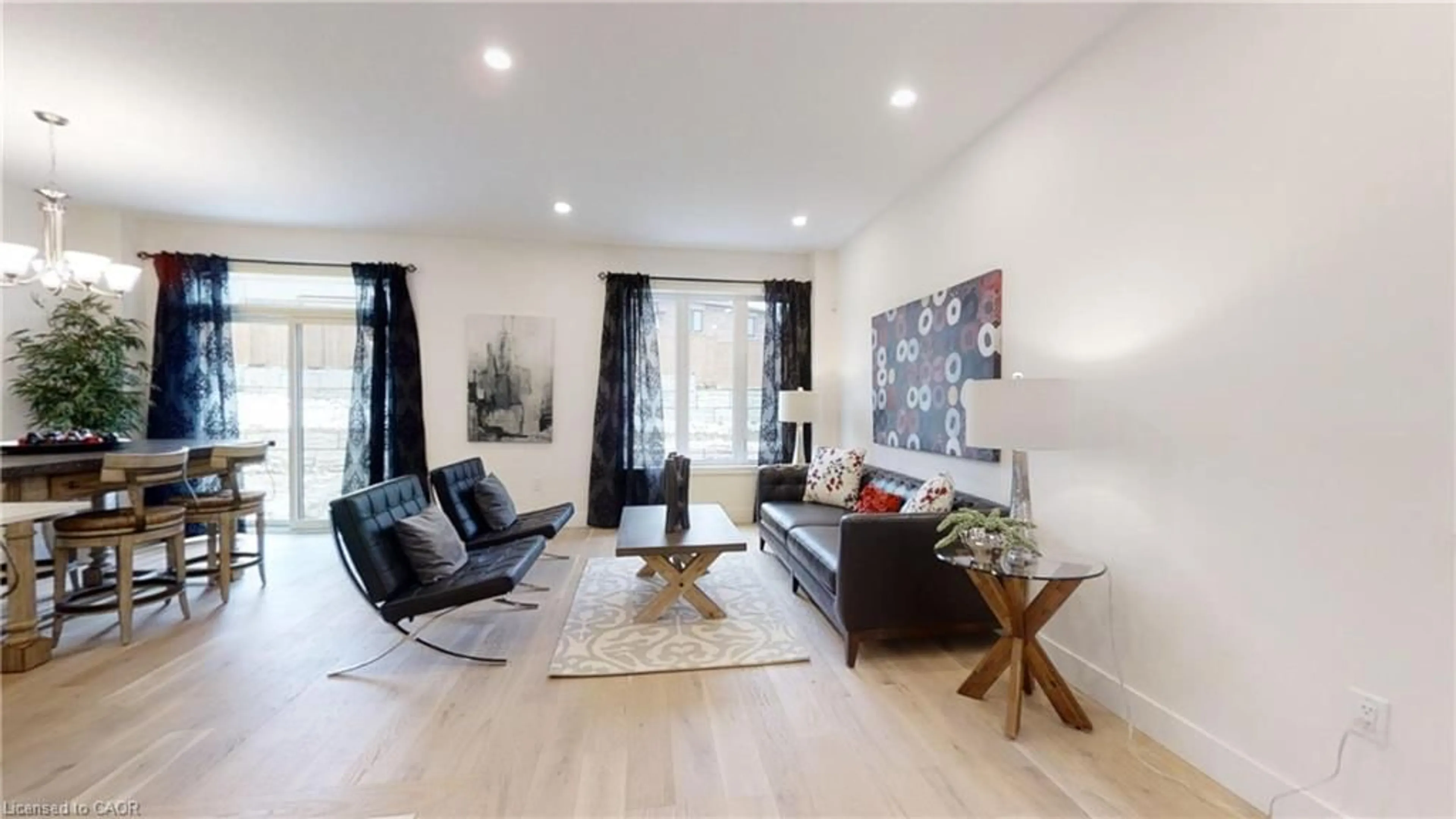 Living room with furniture, wood/laminate floor for 941 Deveron Cres, London Ontario N5X 3X4