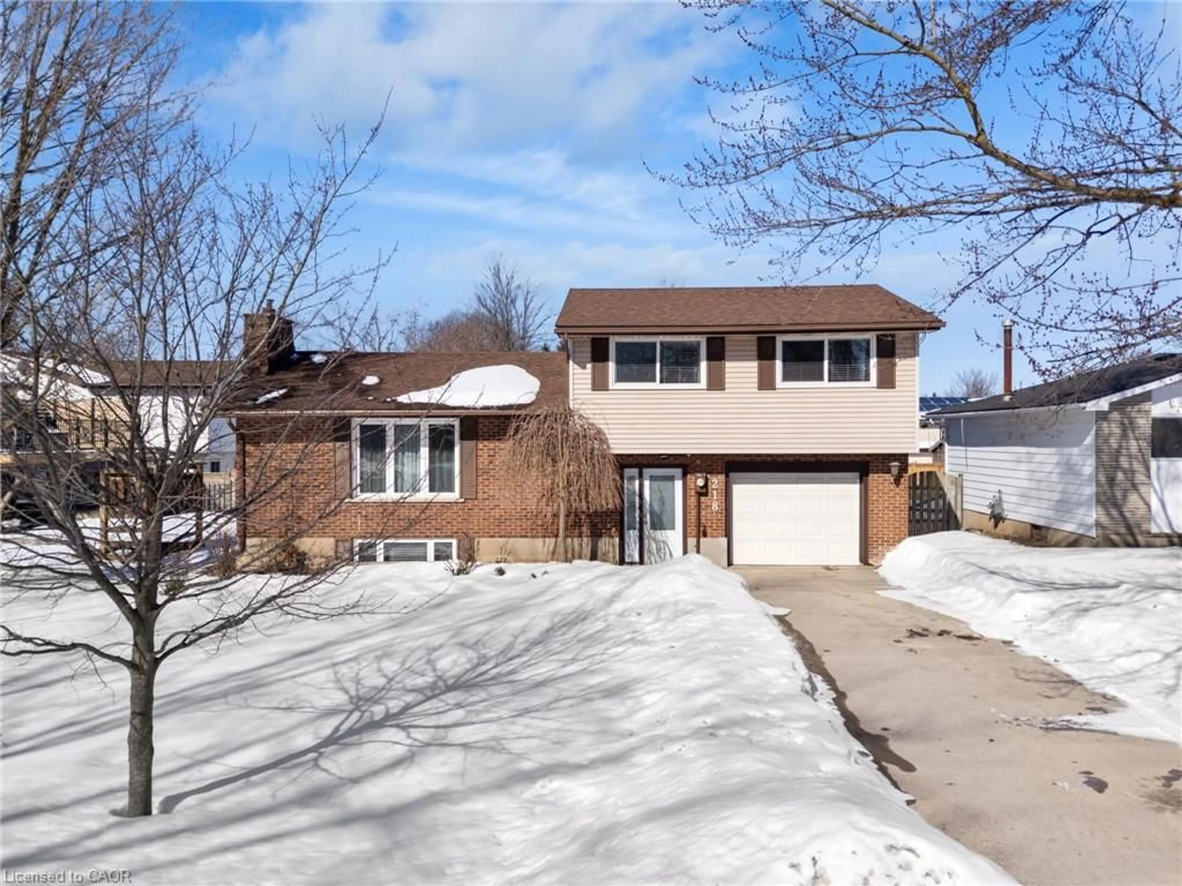 Home with brick exterior material, street for 218 Arris Cres, Mitchell Ontario N0K 1N0