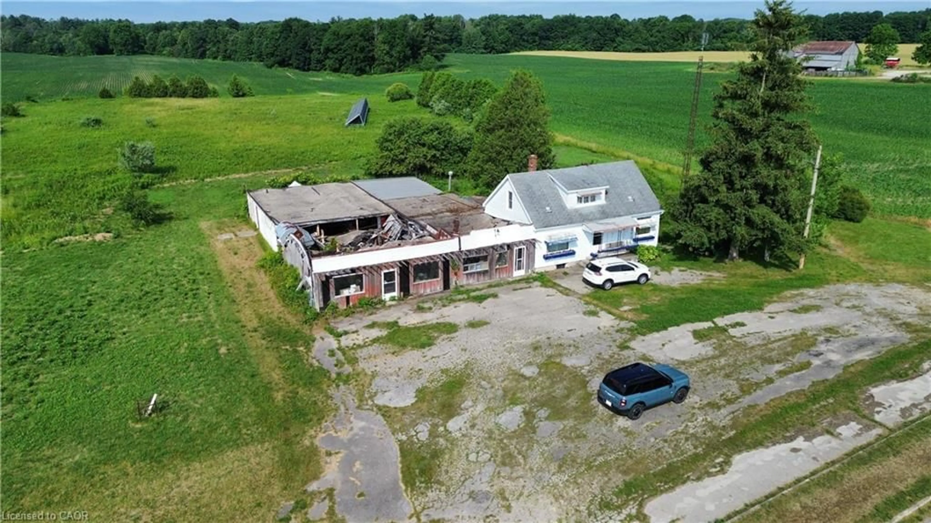 A pic from outside/outdoor area/front of a property/back of a property/a pic from drone, building for 2995 Highway 59, Walsingham Ontario N0E 1G0