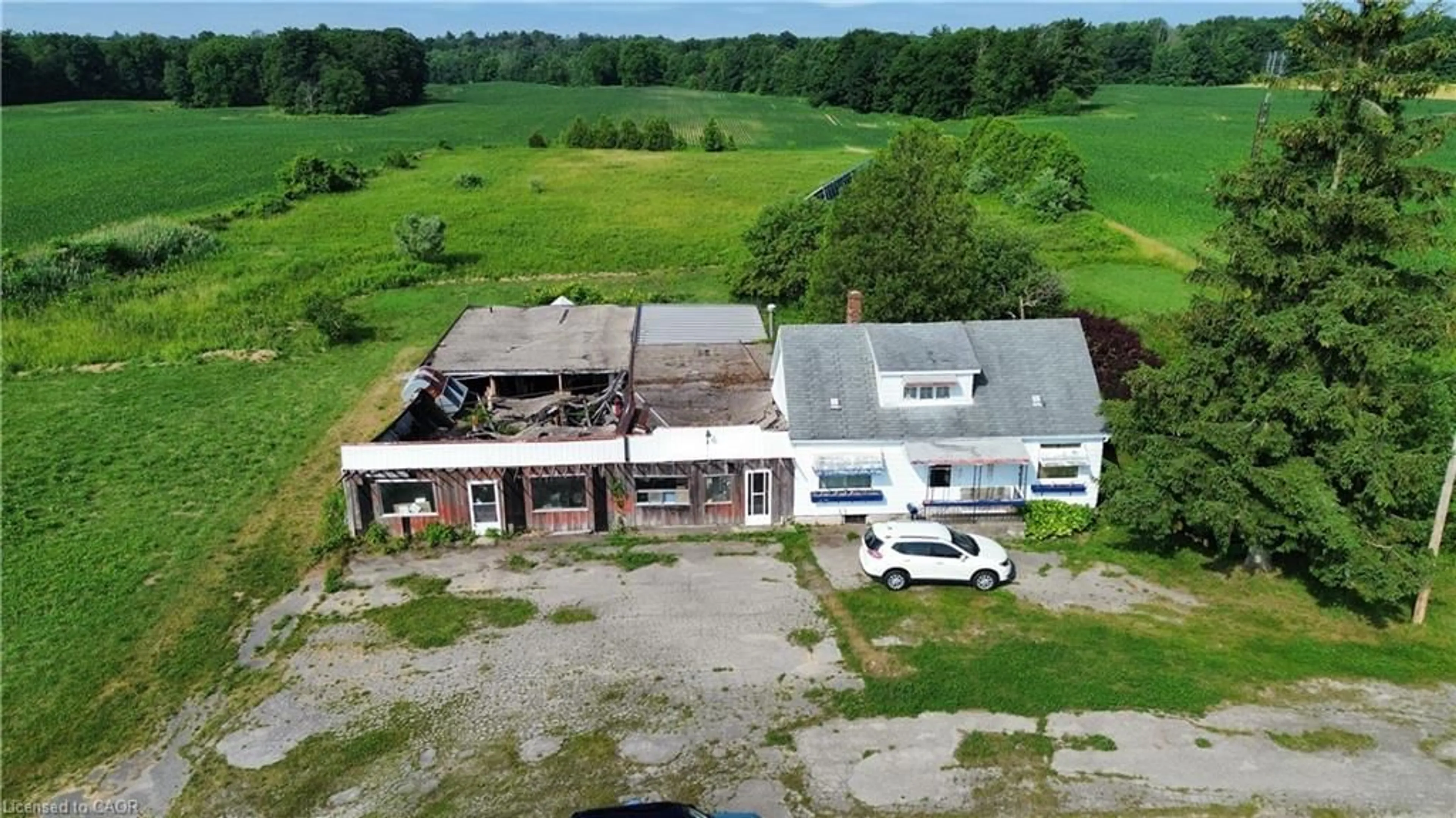 A pic from outside/outdoor area/front of a property/back of a property/a pic from drone, building for 2995 Highway 59, Walsingham Ontario N0E 1G0