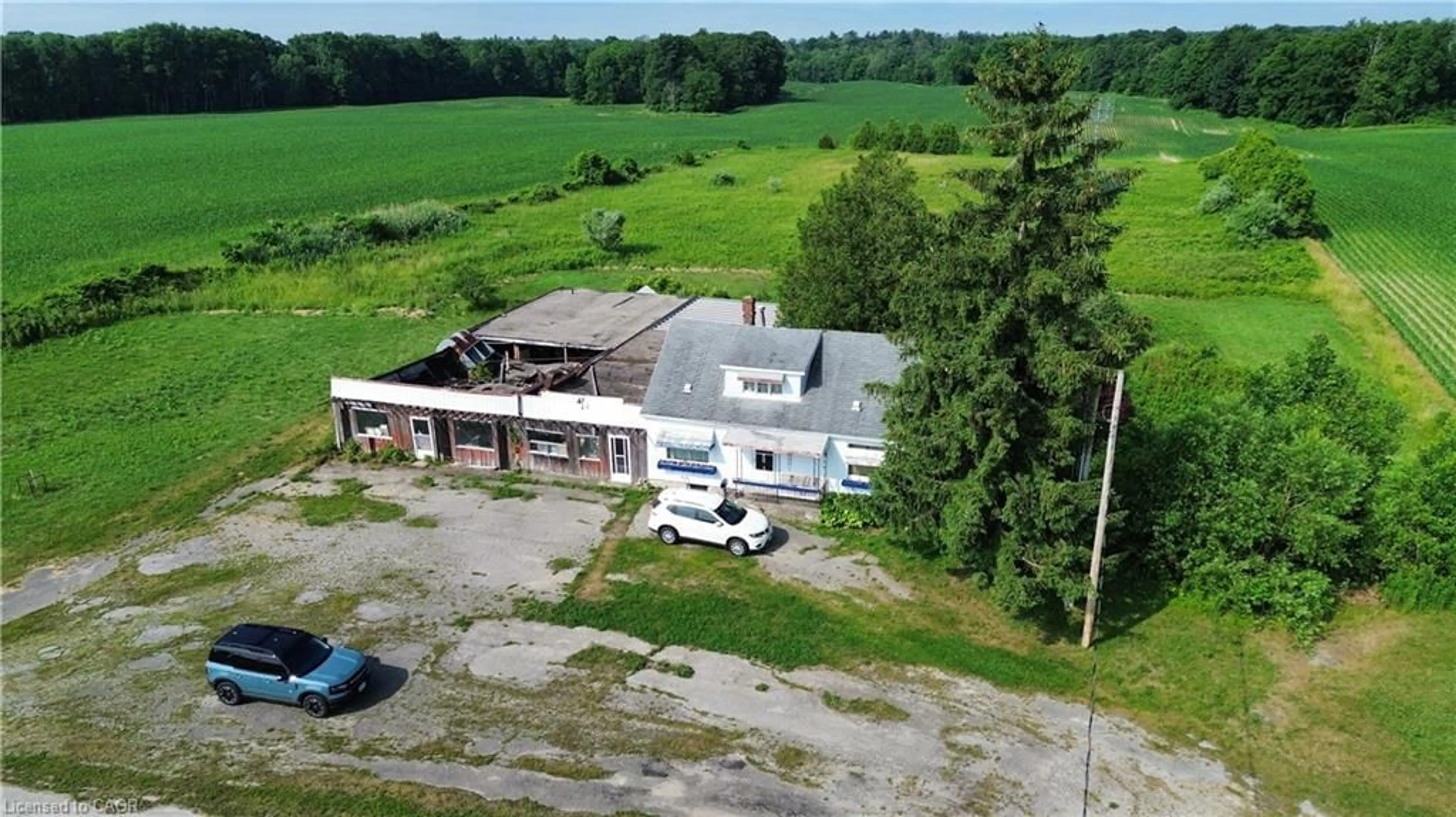 A pic from outside/outdoor area/front of a property/back of a property/a pic from drone, building for 2995 Highway 59, Walsingham Ontario N0E 1G0