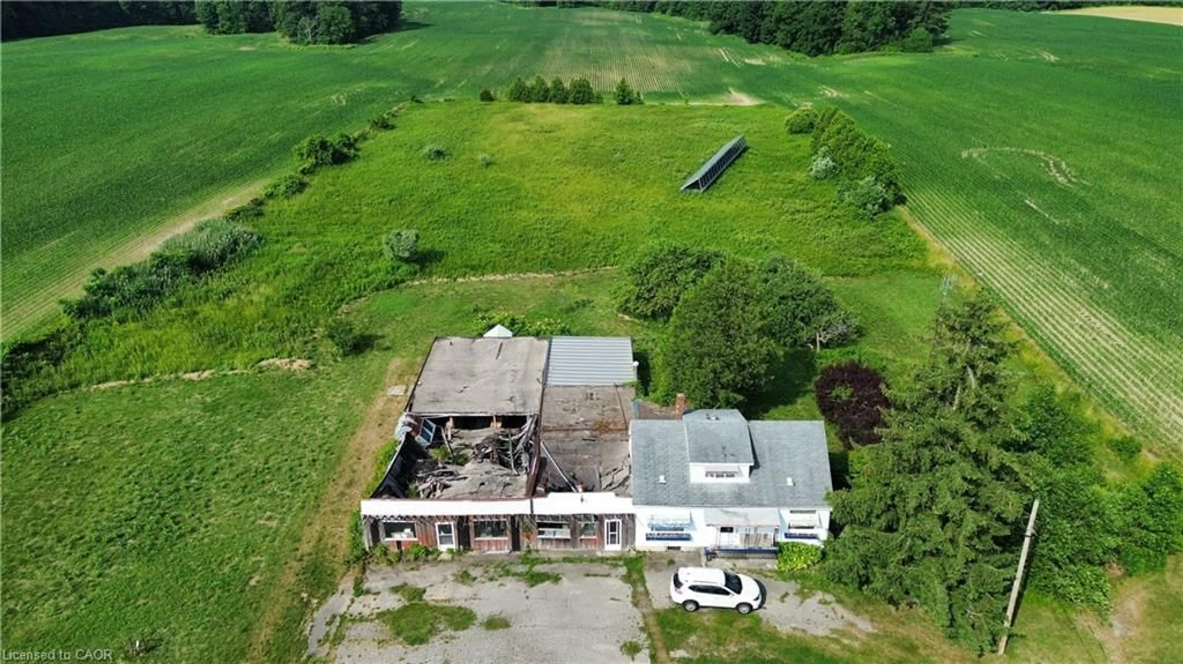 A pic from outside/outdoor area/front of a property/back of a property/a pic from drone, building for 2995 Highway 59, Walsingham Ontario N0E 1G0