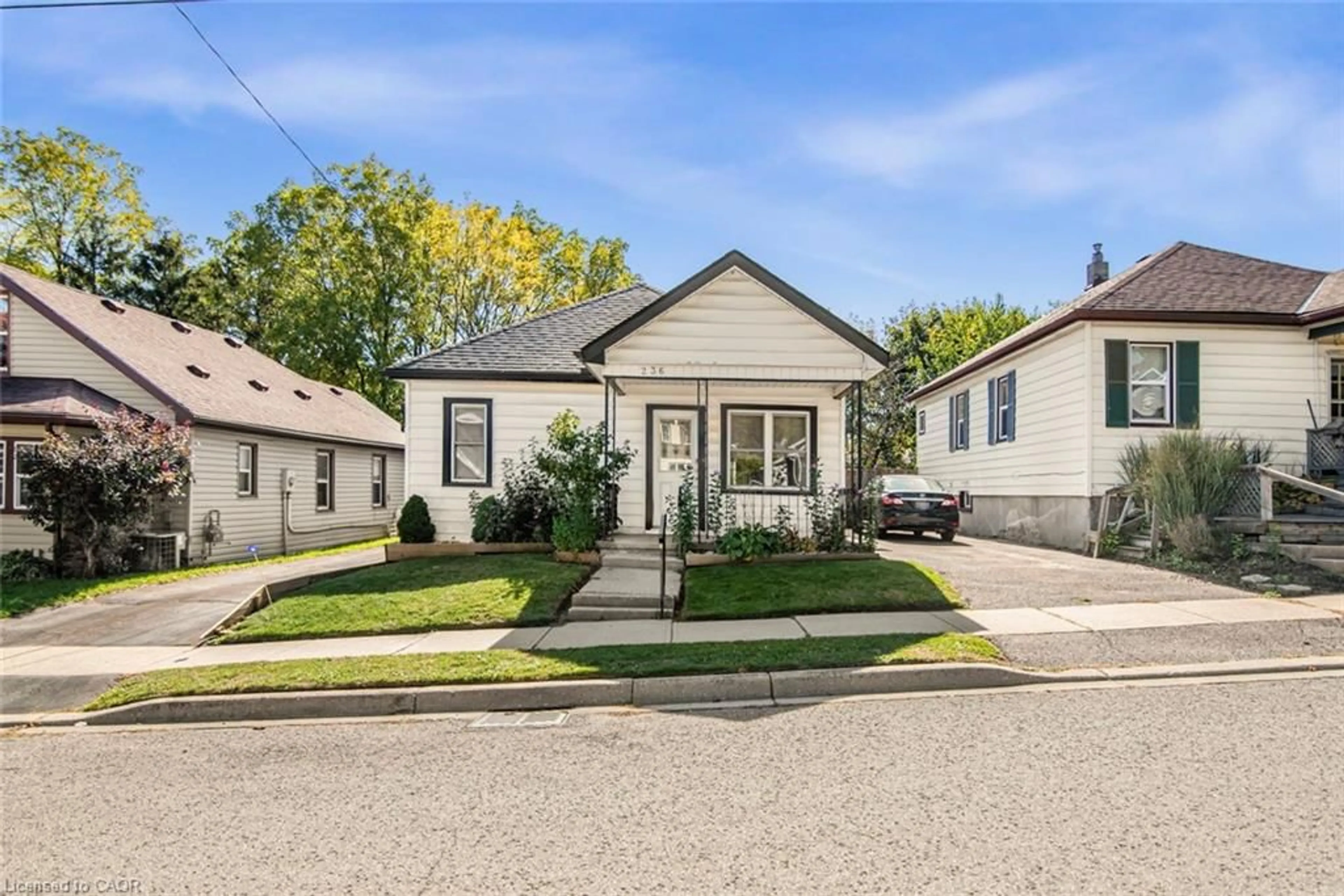 Home with vinyl exterior material, street for 236 Grove St, Simcoe Ontario N3Y 1K9