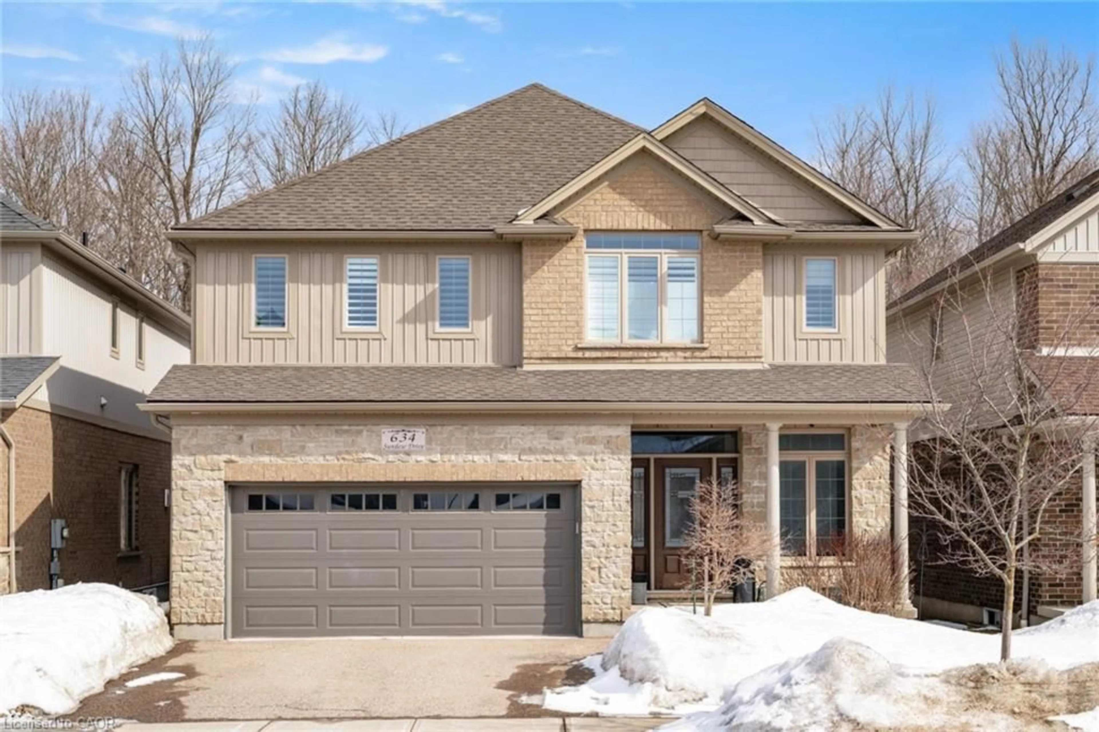 Home with brick exterior material, street for 634 Sundew Dr, Waterloo Ontario N2V 0C1