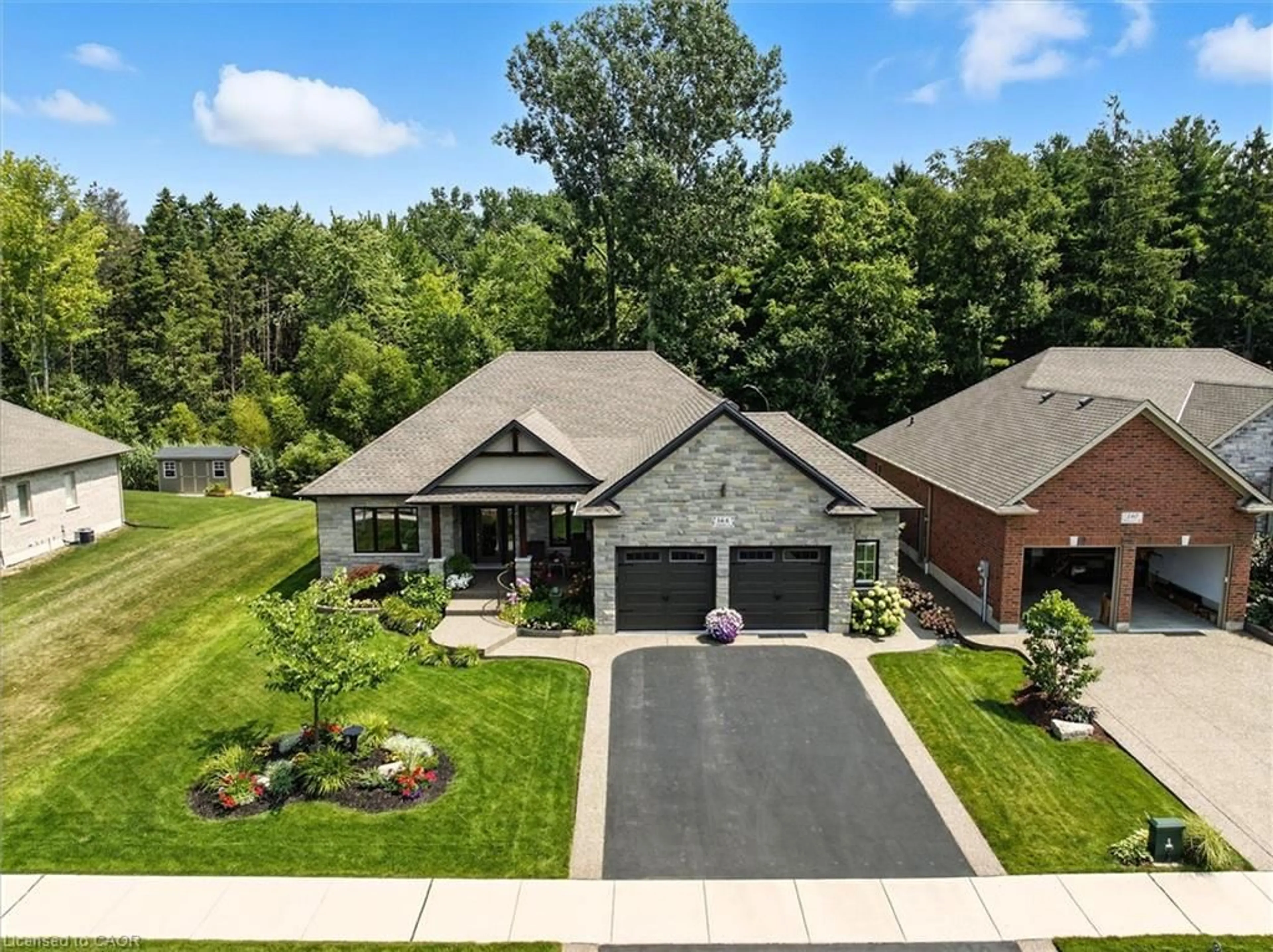 A pic from outside/outdoor area/front of a property/back of a property/a pic from drone, street for 144 Newport Lane, Port Dover Ontario N0A 1N7