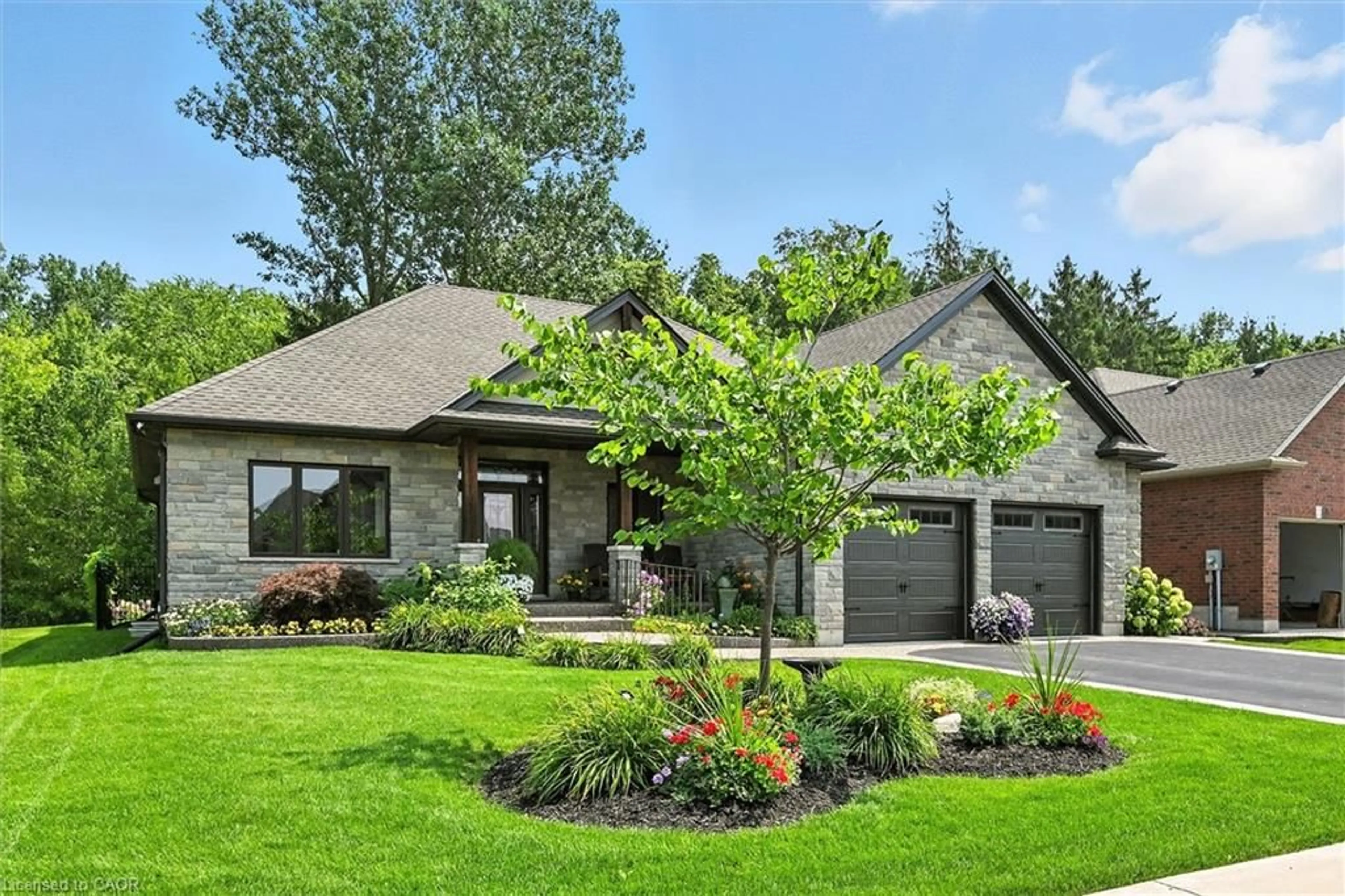 Home with brick exterior material, street for 144 Newport Lane, Port Dover Ontario N0A 1N7