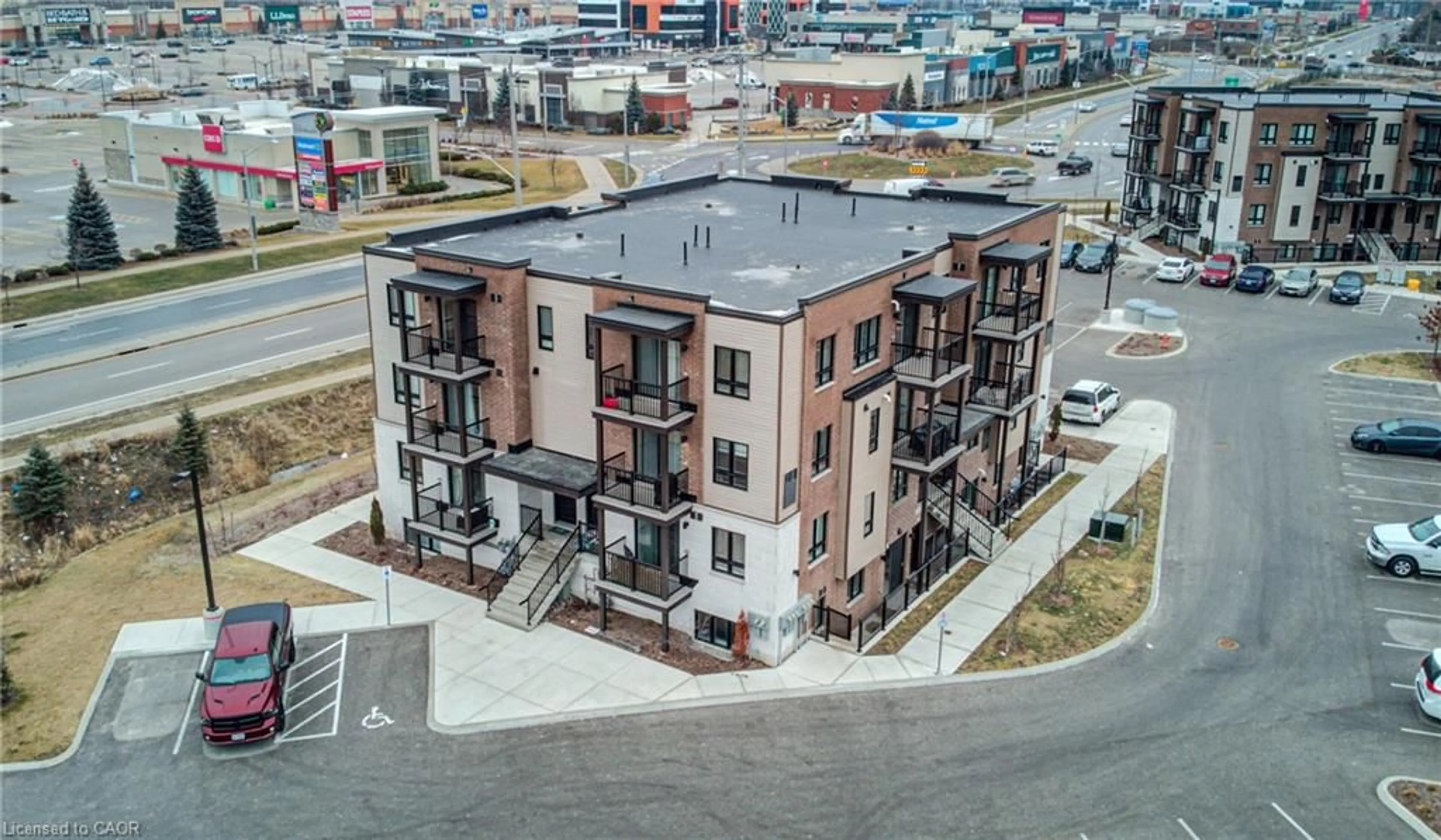A pic from outside/outdoor area/front of a property/back of a property/a pic from drone, city buildings view from balcony for 1331 Countrystone Dr #A11, Kitchener Ontario N2N 0C5