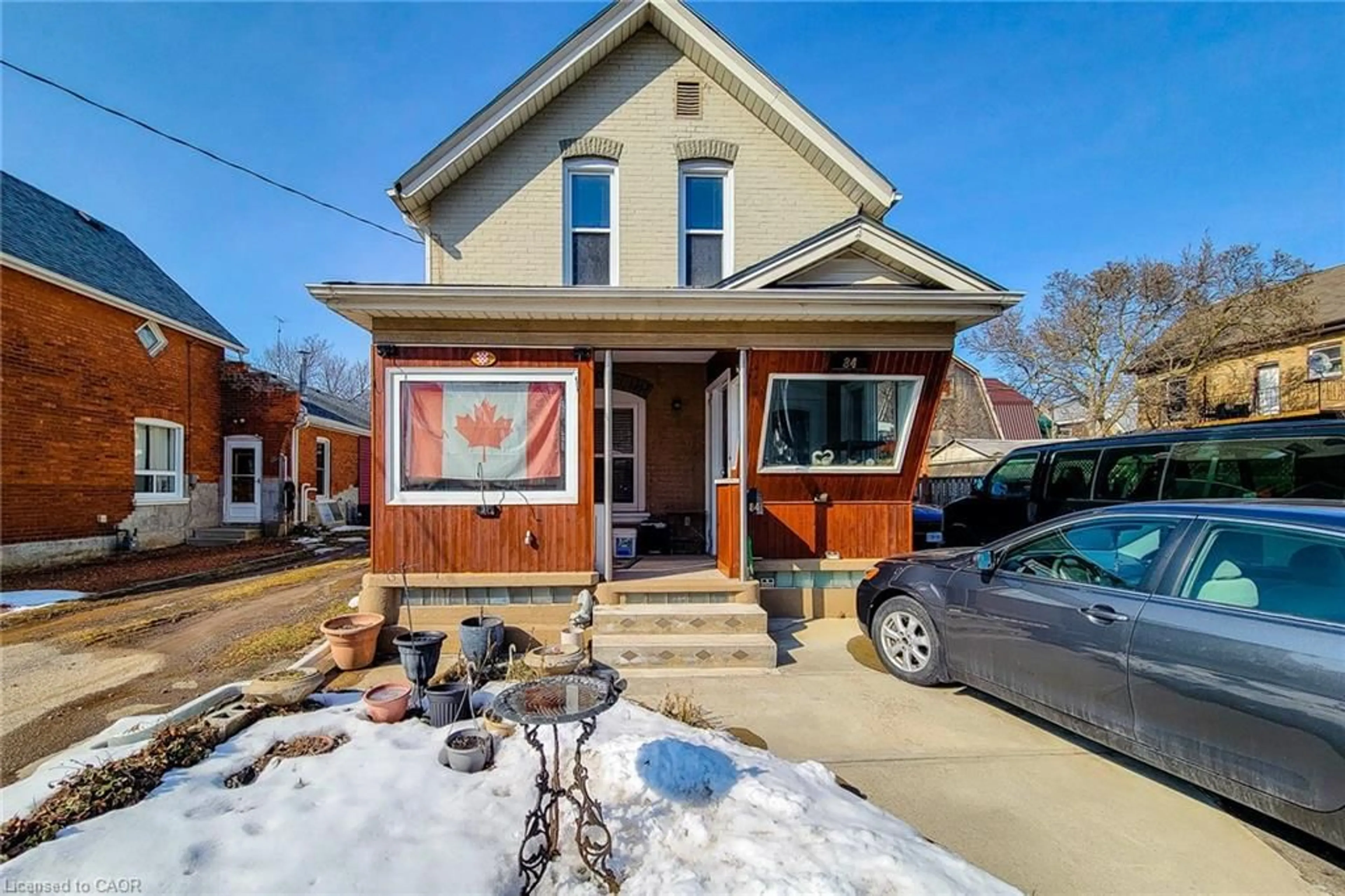 Home with brick exterior material, street for 84 Port St, Brantford Ontario N3S 1Y7