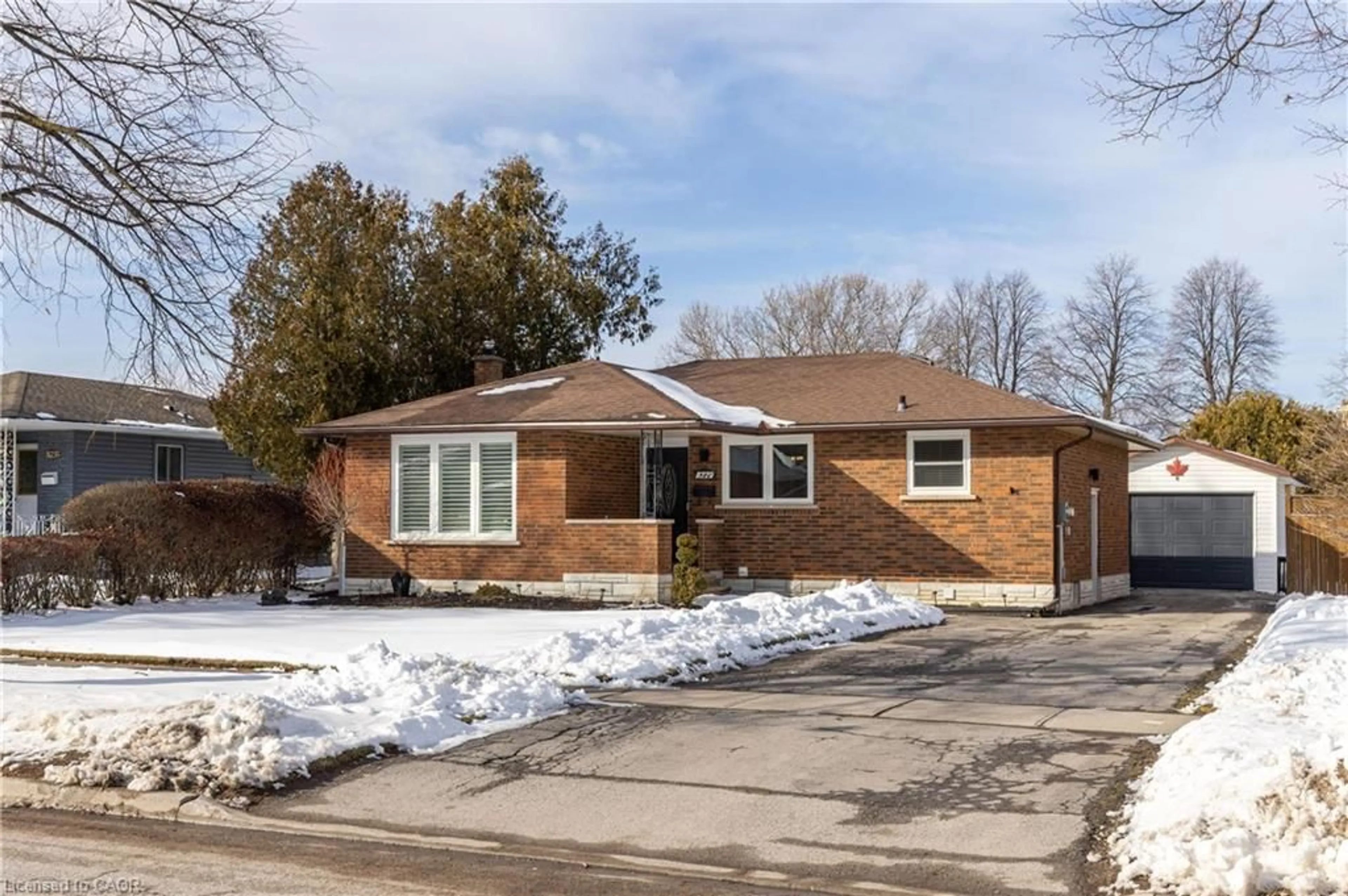Home with brick exterior material, street for 8225 Paddock Trail Dr, Niagara Falls Ontario L2H 1X1