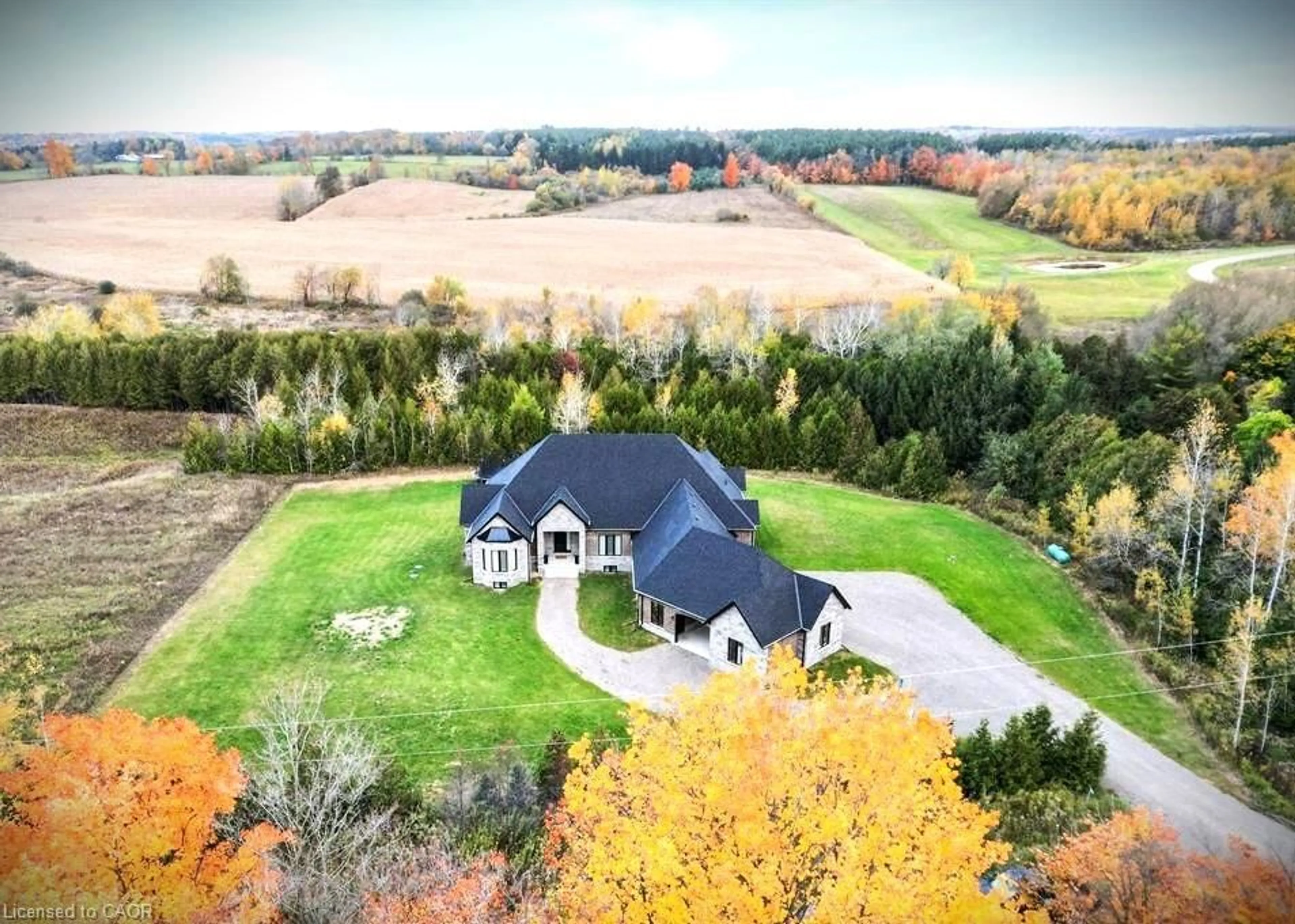 A pic from outside/outdoor area/front of a property/back of a property/a pic from drone, unknown for 9042 Sideroad 10, Erin Ontario L7J 2L8