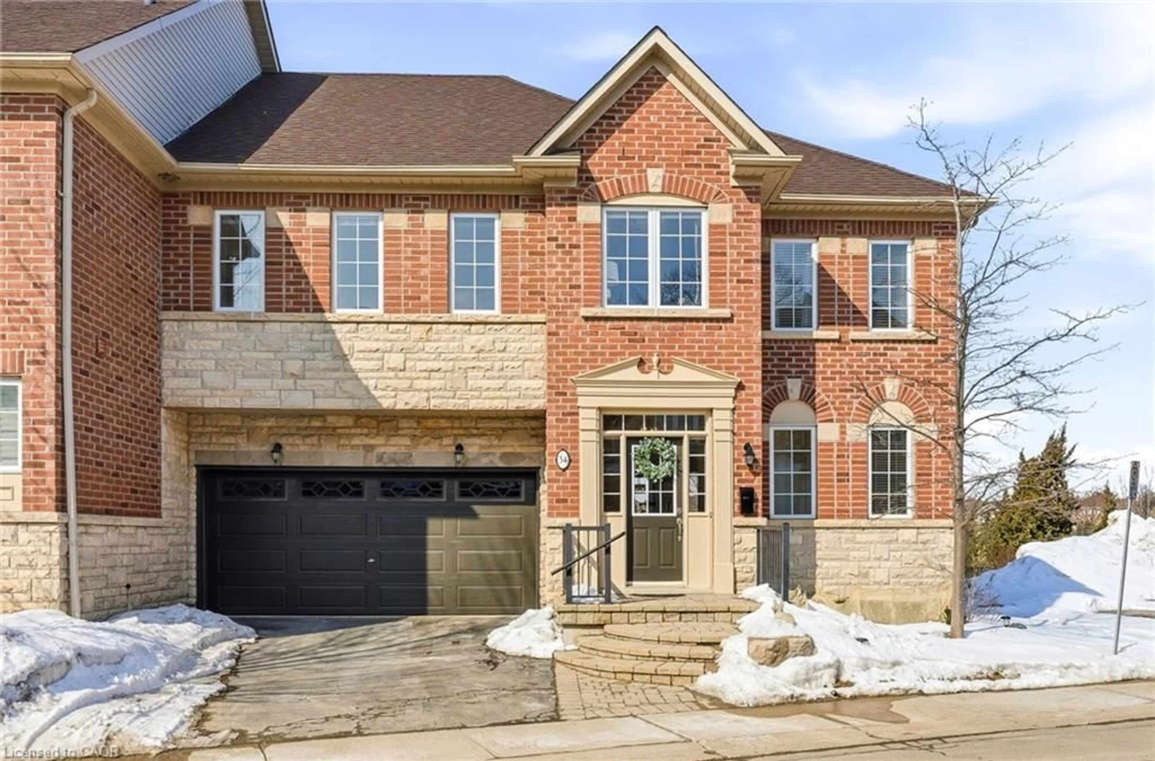 Home with brick exterior material, street for 300 Ravineview Way #34, Oakville Ontario L6H 7J1