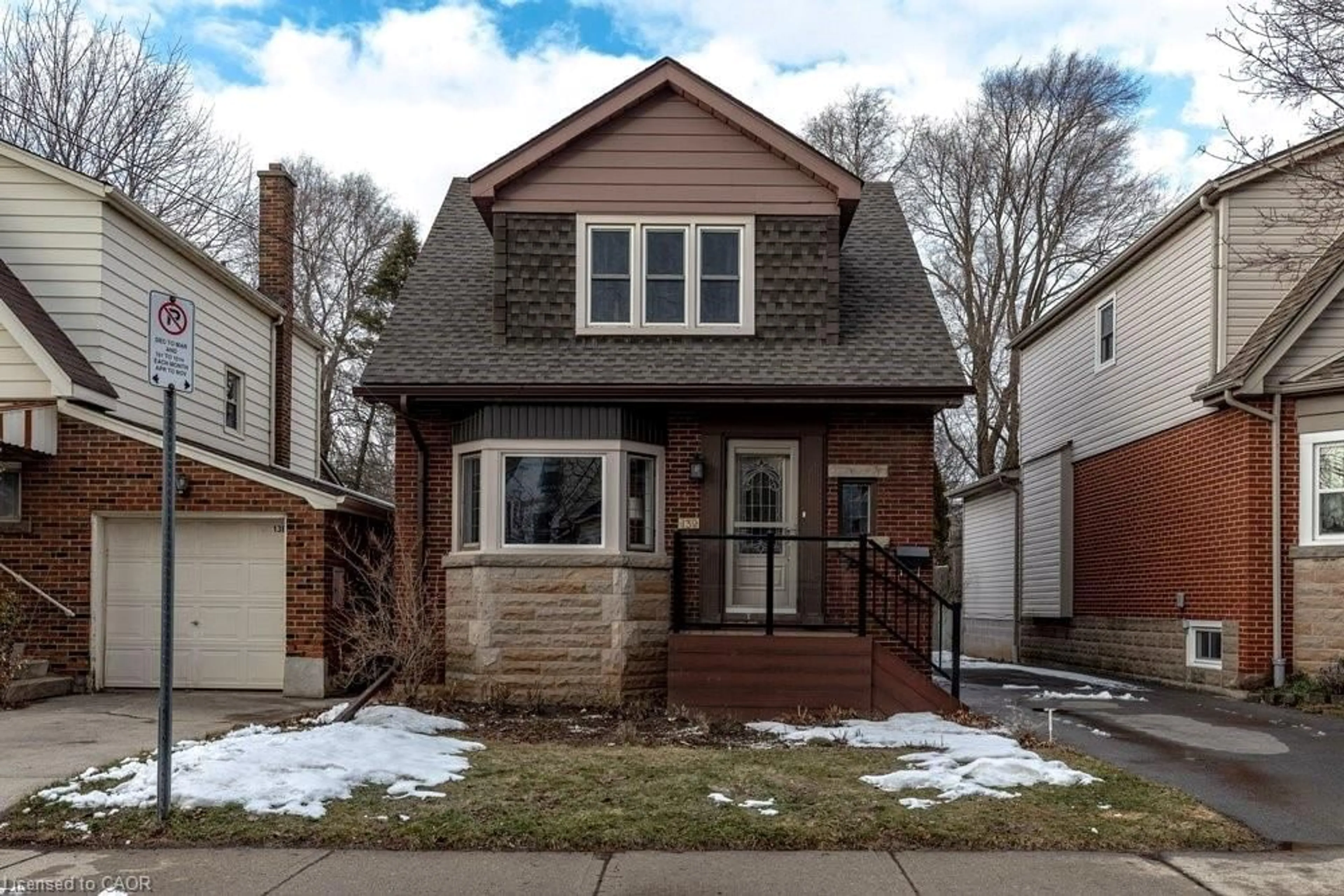 Home with brick exterior material, street for 132 Glen Rd, Hamilton Ontario L8S 3M9