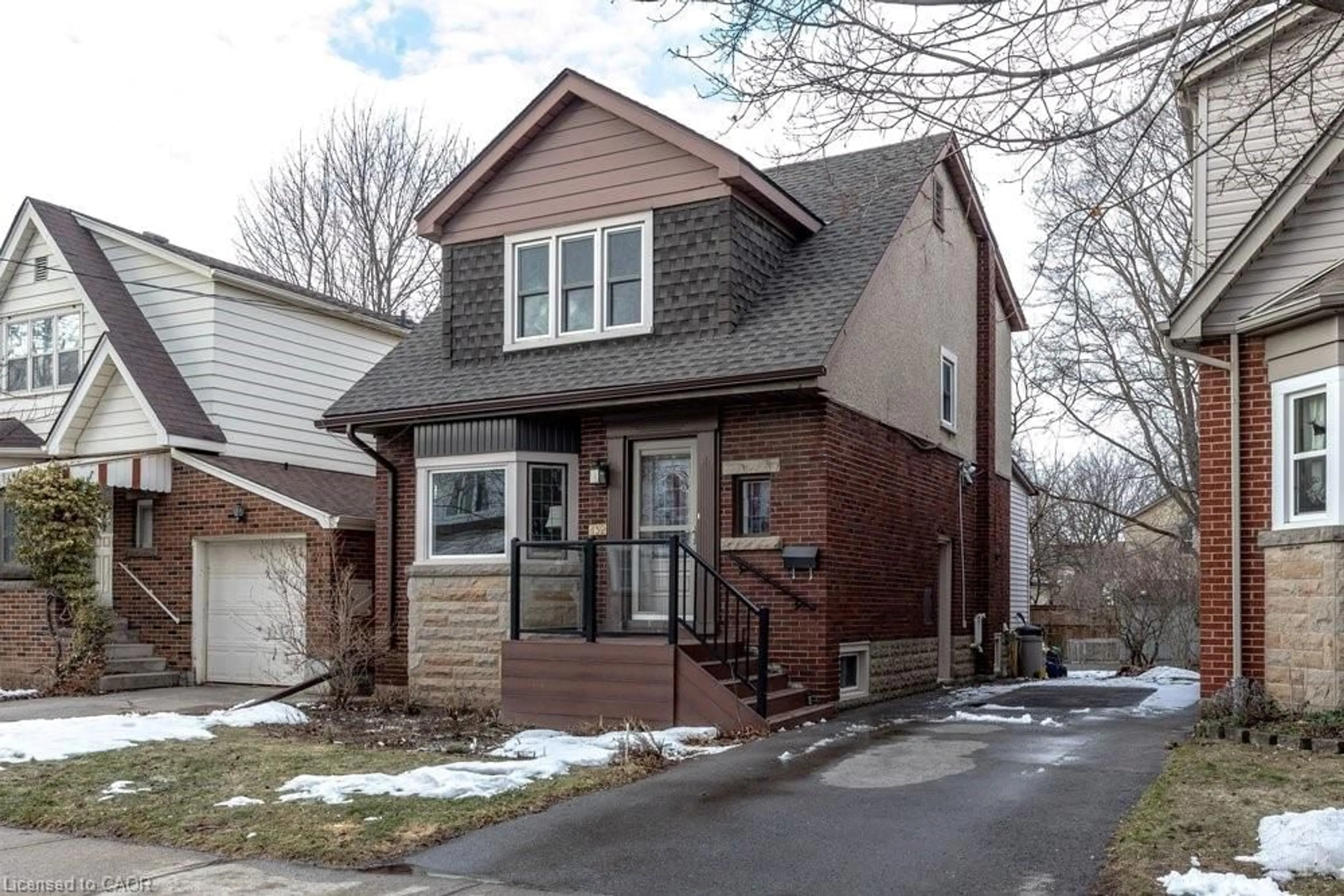 Home with brick exterior material, street for 132 Glen Rd, Hamilton Ontario L8S 3M9