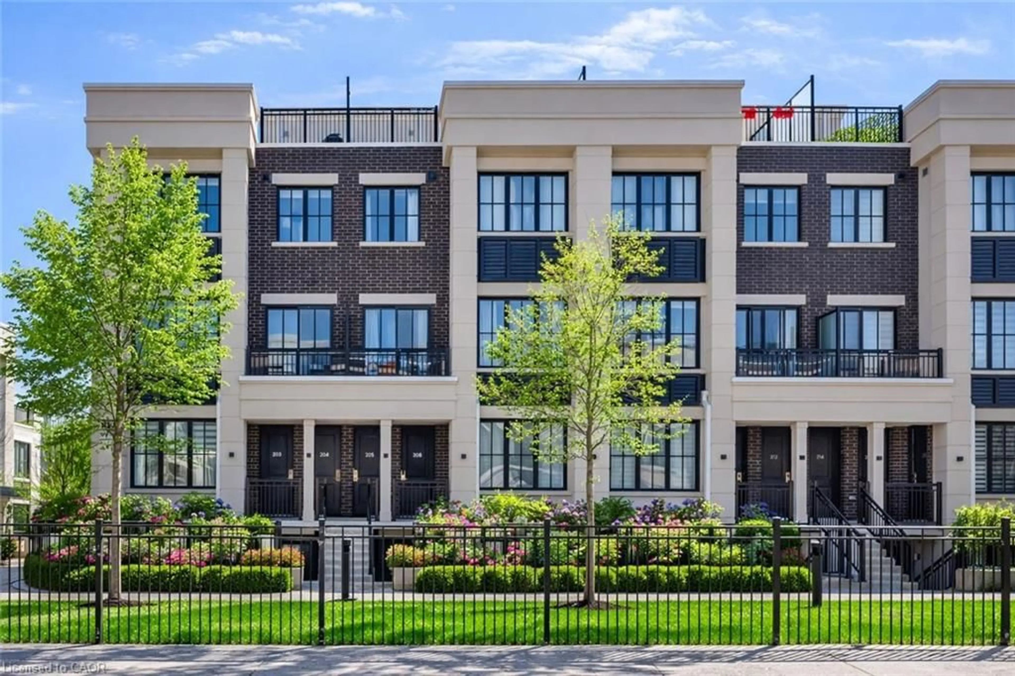 Home with brick exterior material, street for 652 Cricklewood Dr #203, Mississauga Ontario L5E 0A5