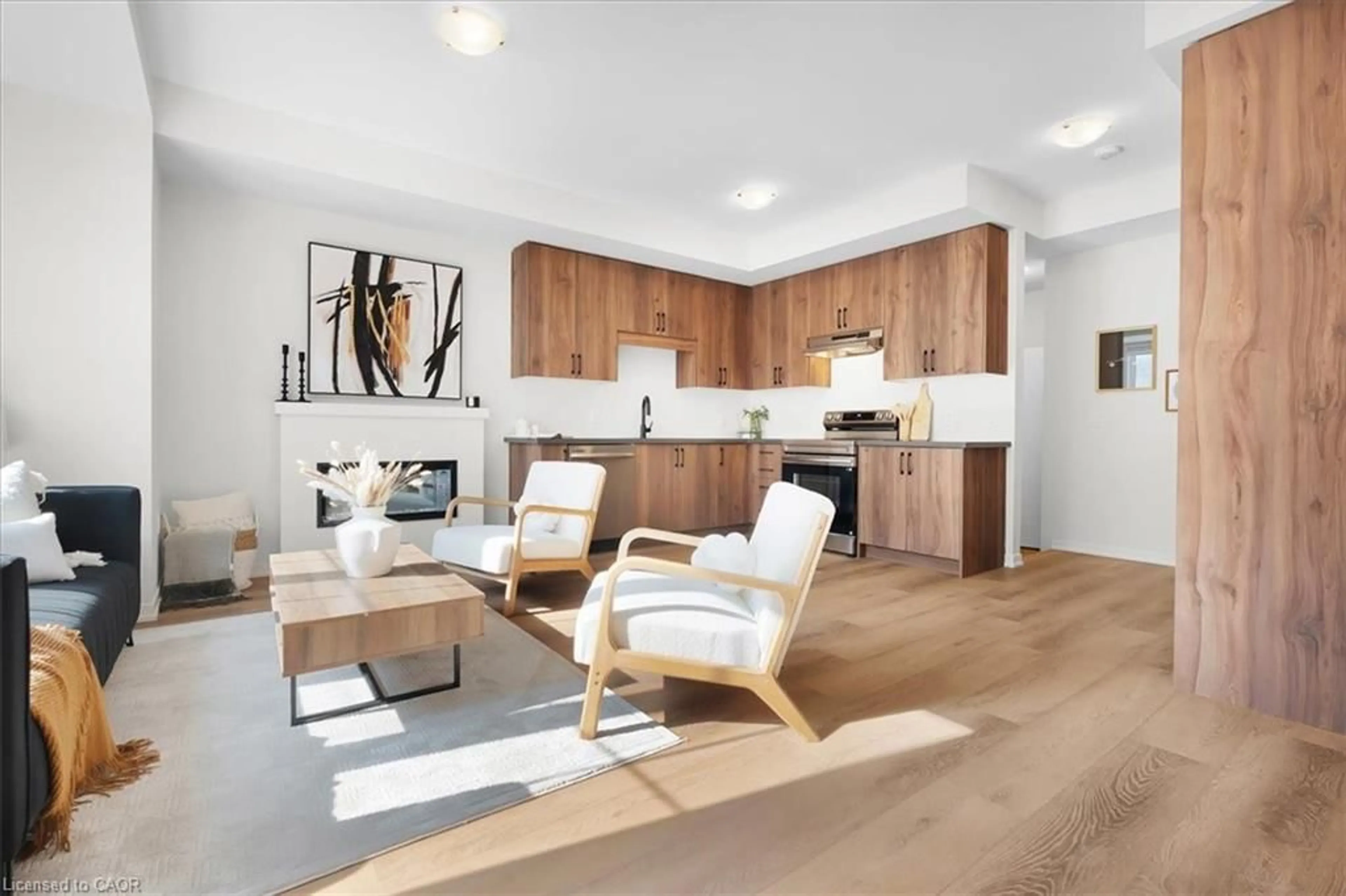 Open concept kitchen, wood/laminate floor for 38 Kingbird Common, Cambridge Ontario N1T 0H3